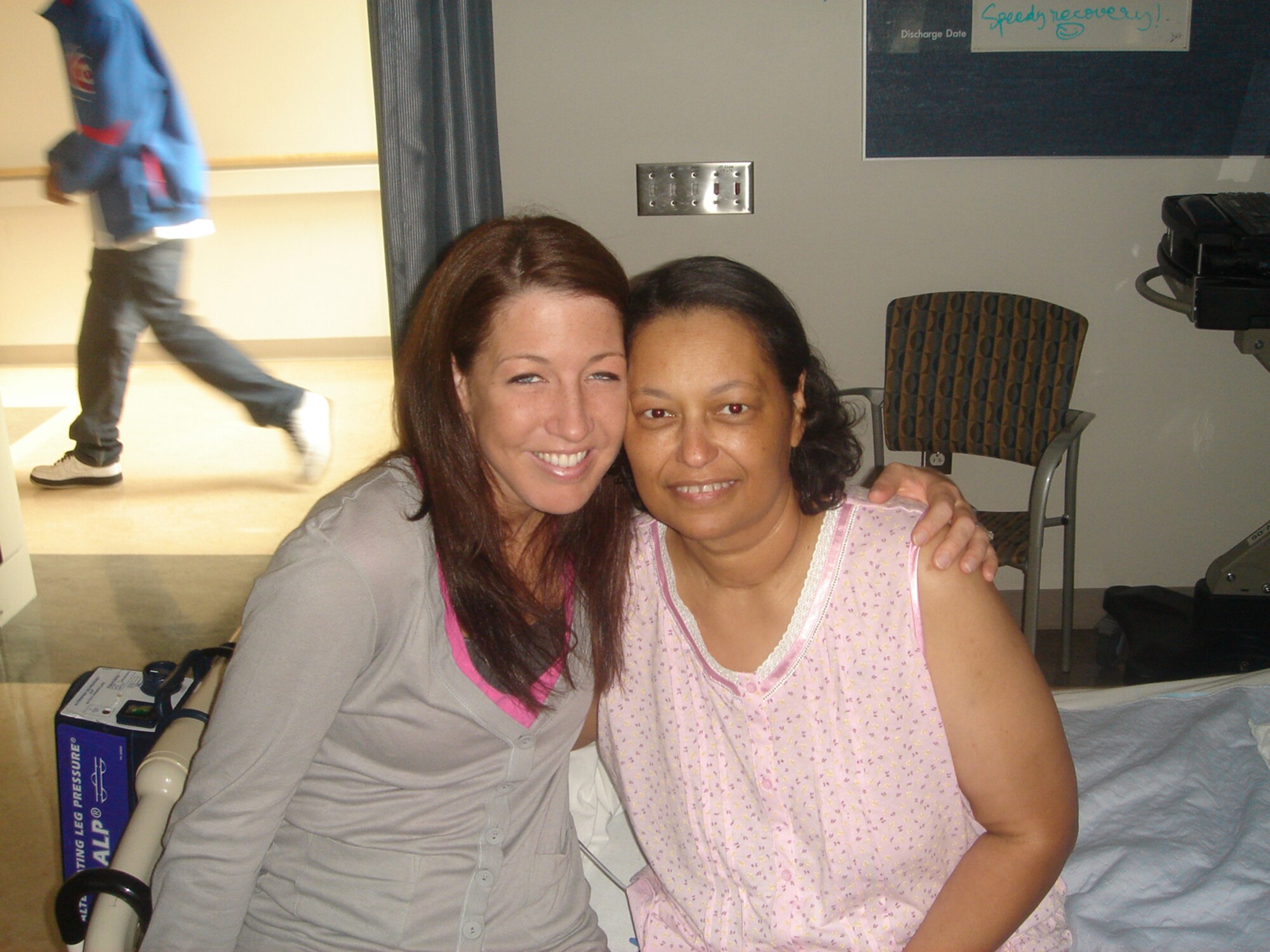 LOS ANGELES -- Master Sgt. Nicole Lanstrum, 612th Air Operations Center intelligence analyst (left) gives Valinda Jones a hug after a successful kidney transplant between the two June 9. Sergeant Lanstrum selflessly donated a kidney to Jones as part of a donor transplant chain. (Courtesy photo)