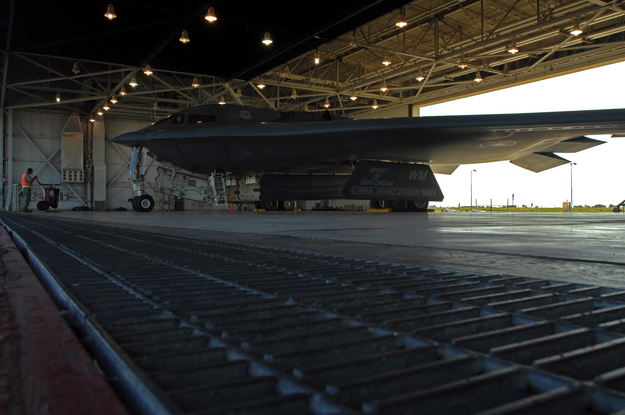 WHITEMAN AIR FORCE BASE, Mo. – A B-2 Spirit sits in a hanger while being prepped for takeoff by crew chiefs with the 509th Aircraft Maintenance Squadron, Aug. 22, 2009. Twenty B-2 Spirit aircrafts are assigned to the 509th Bomb Wing. The B-2 brings massive firepower to bear, in a short time, anywhere on the globe through previously impenetrable defenses. (U.S. Air Force photo/Senior Airman Kenny Holston)