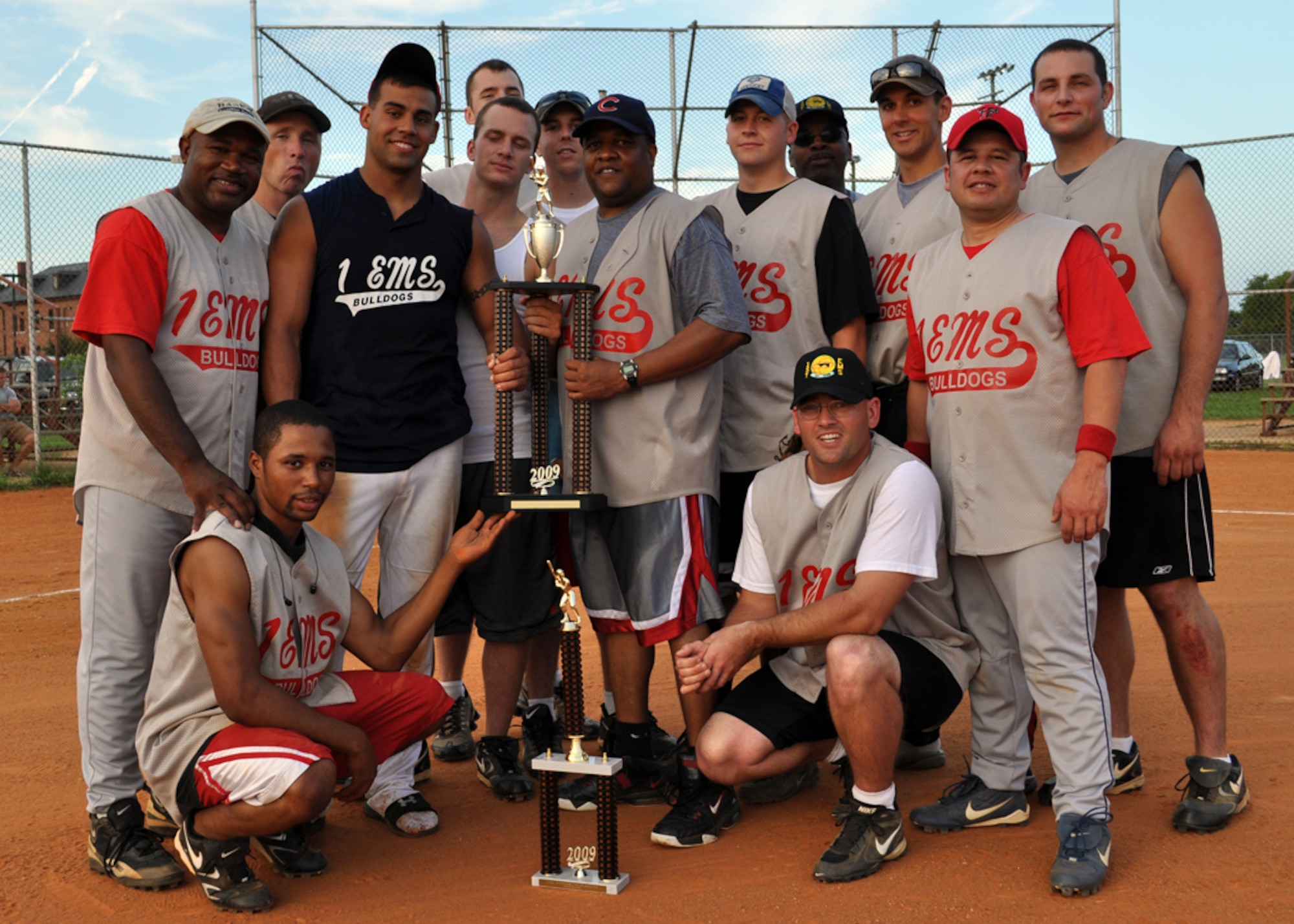 LANGLEY AIR FORCE BASE, Va. -- The 1st Equipment Maintenance Squadron Bulldogs hold their trophy after winning the Langley Intramural Softball League Championship here Aug. 18. (U.S. Air Force courtesy photo)