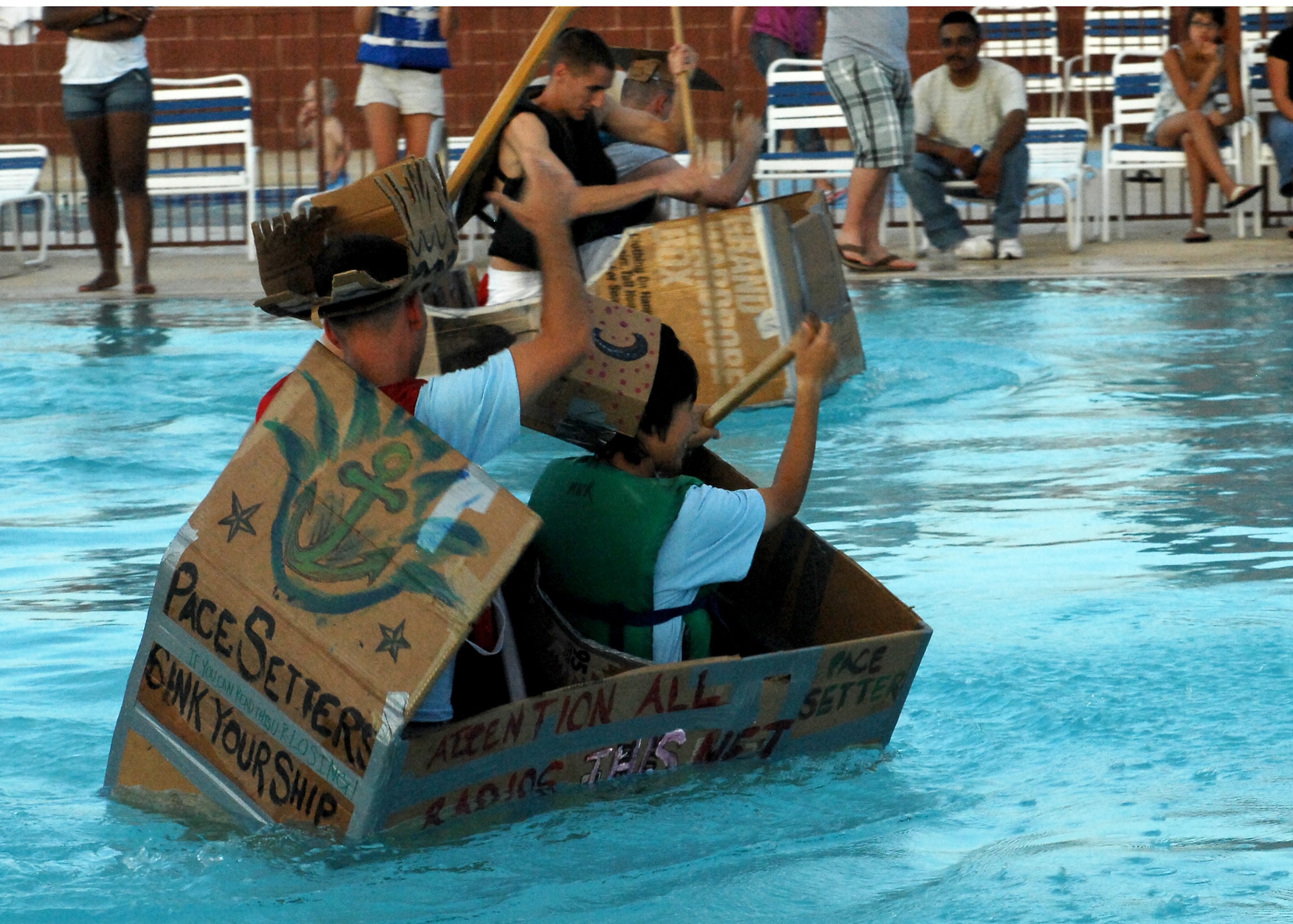 DYESS AIR FORCE BASE, Texas – The Pace Setters, Airmen from the 317th Maintenance Operation Squadron, participated in a Build-a-Boat contest here Aug. 21. The contestants had a little more than an hour to plan and complete their boats made out of cardboard. The contest is an annual hallmark event that the headquarters Air Force Services Agency and 7th Force Support Squadron support. (U.S. Air Force photo by Airman 1st Class Chelsea L. Browning)