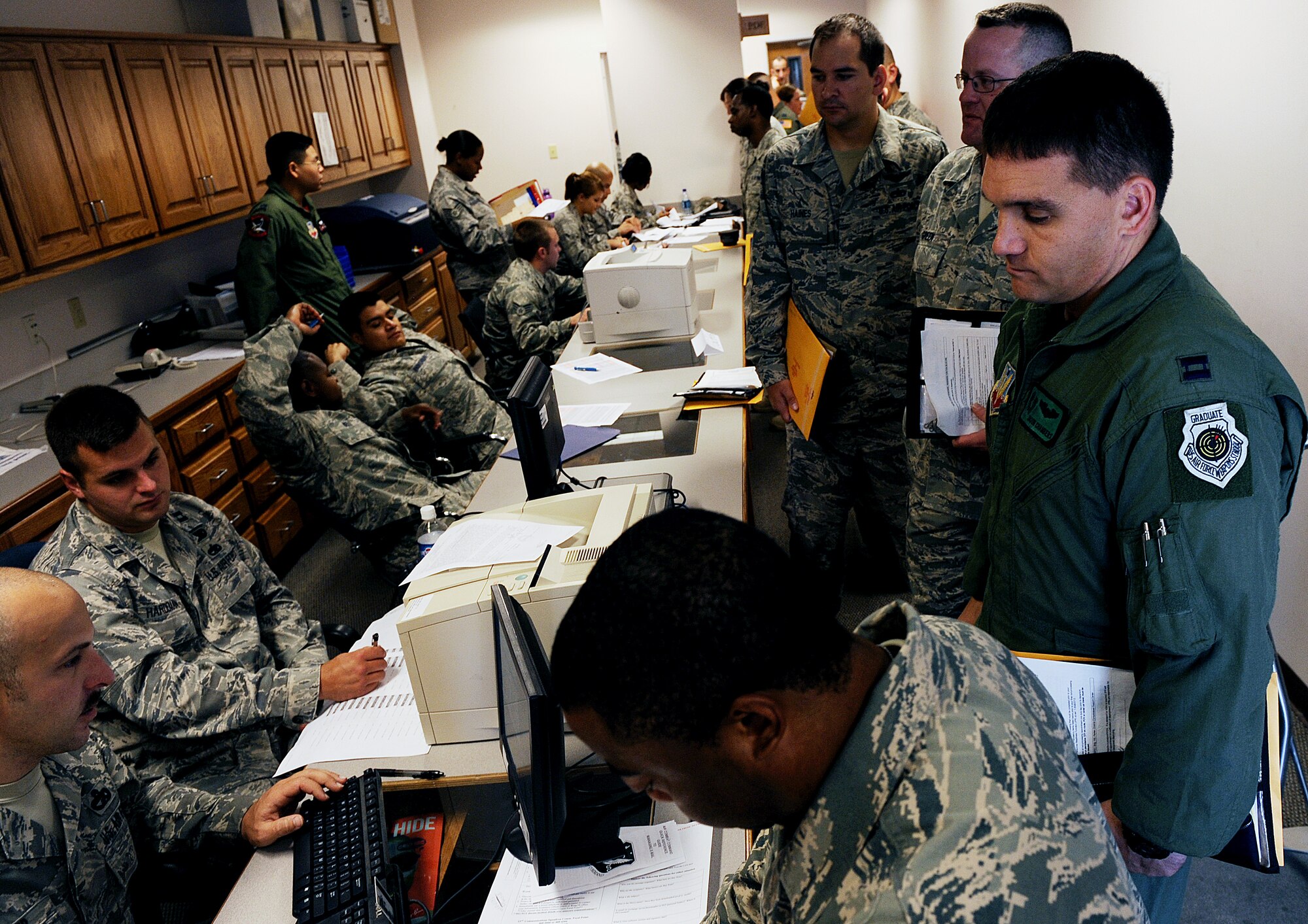 MOODY AIR FORCE BASE, Ga. -- Airmen from Moody process through a deployment line here Aug. 21. The Airmen are tasked for a six-month deployment to Balad Air Base, Iraq. (U.S. Air Force photo by Airman 1st Class Joshua Green)
