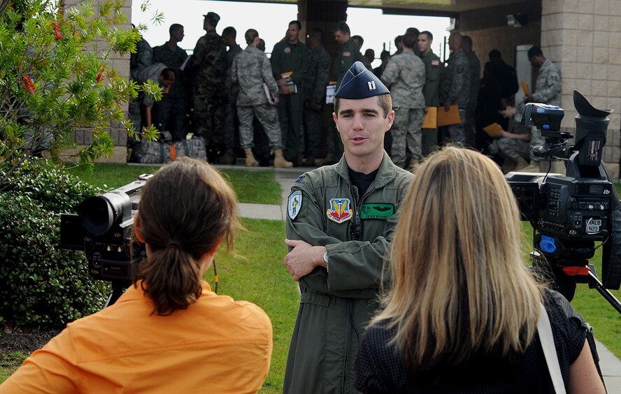 MOODY AIR FORCE BASE, Ga. -- Capt. Sean Ruane, 41st Rescue Squadron scheduler and HH-60G Pave Hawk co-pilot, speaks to news reporters about a Moody deployment here Aug. 21. (U.S. Air Force photo by Airman 1st Class Joshua Green)