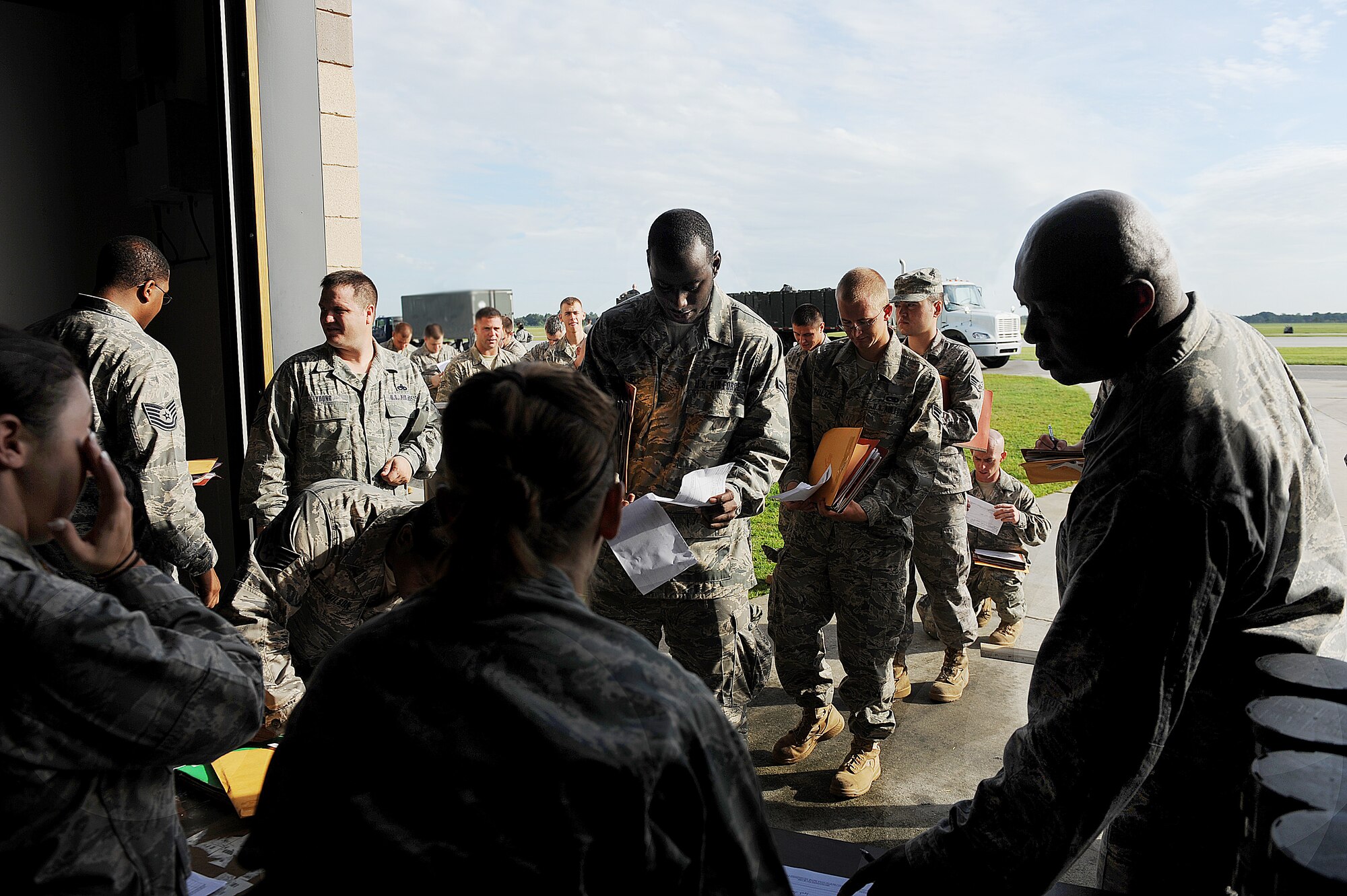 MOODY AIR FORCE BASE, Ga. -- Moody Airmen process through a mobility line prior to deploying here Aug. 21. Airmen from Moody are tasked to deploy in support of Operation Iraqi Freedom. (U.S. Air Force photo by Airman 1st Class Joshua Green)