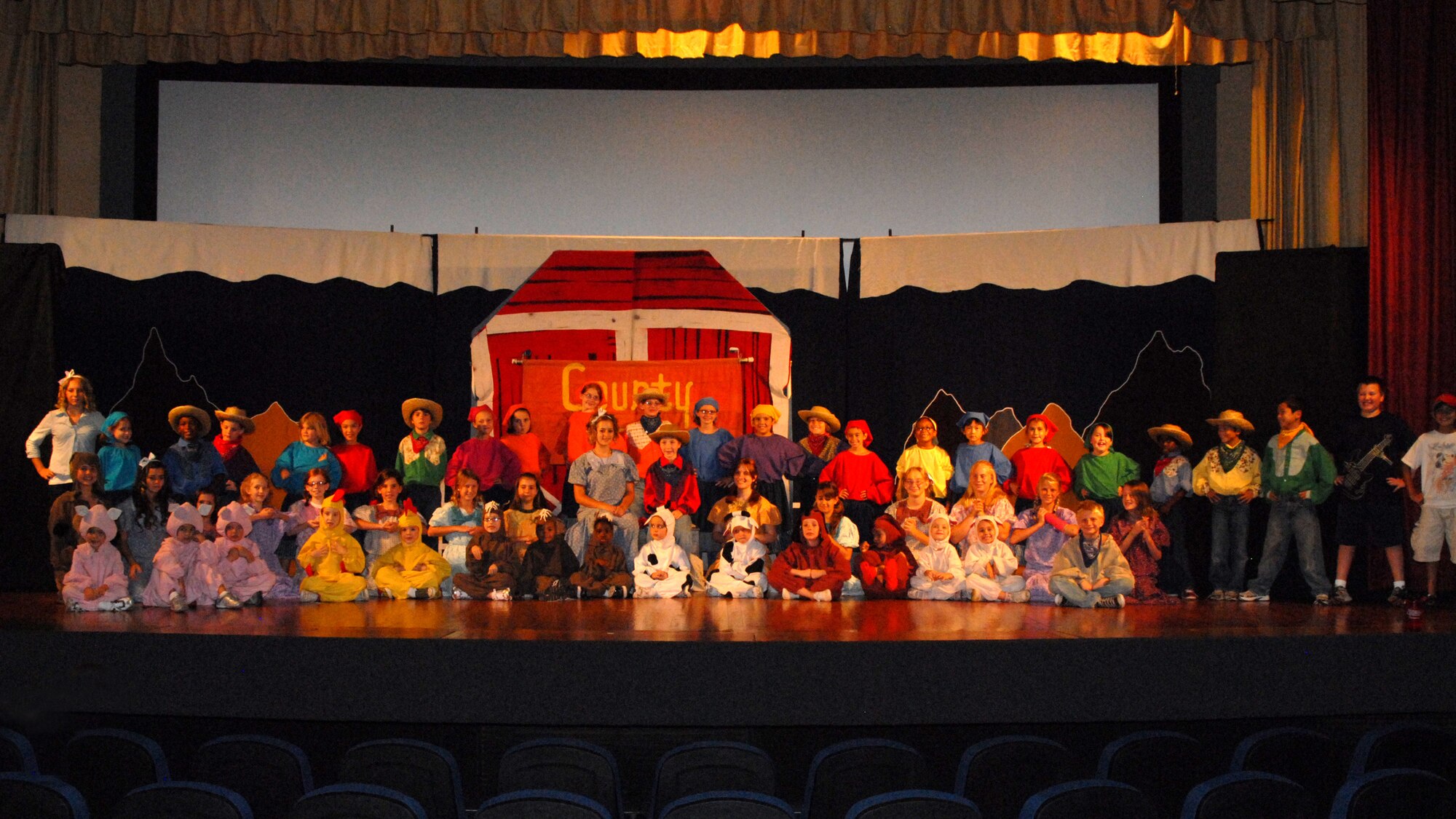 Kindergarten through twelfth graders from Goodfellow AFB star in a full-scale musical, Beauty Lou and the Country Beast, at the base theater Aug. 14 and 15.   The Missoula Children's Theatre provides a week-long performance workshop and rehearsals that culminate in two full-scale musical public performances starring almost 60 Goodfellow youth.  (U.S. Air Force / Robert D. Martinez)