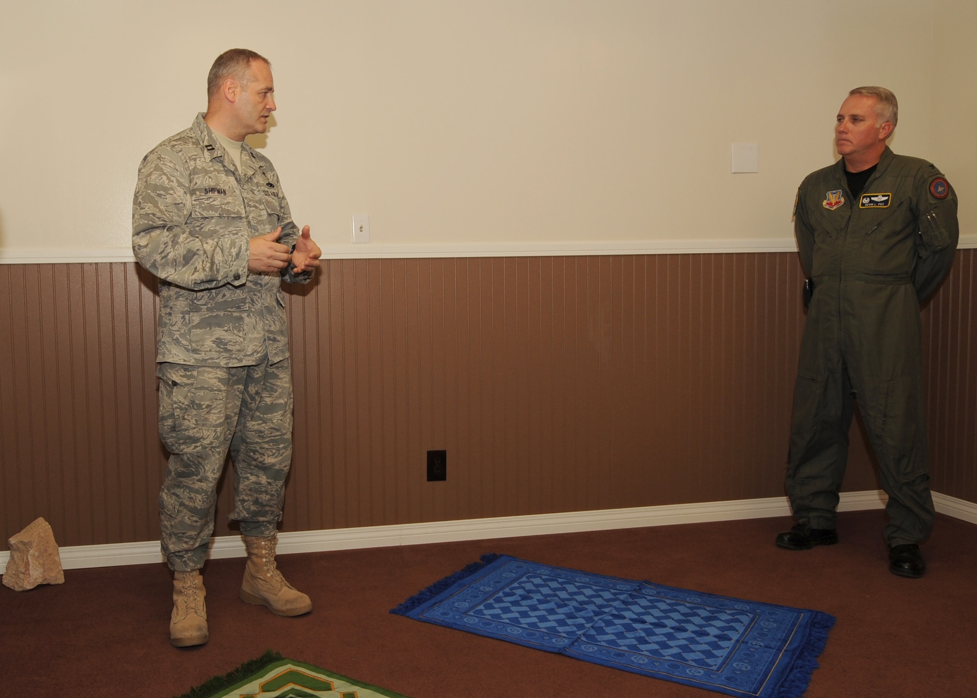 NELLIS AIR FORCE BASE NEV.,-- Captain John Shippman, 99th Force Support Squadron chaplain and Col. Kevin Fox, Commander of the 99th Mission Support Group, discuss how the new Muslim prayer room, located inside the Base Chapel, was constructed. The room was built to provide Muslim servicemembers a place to worship and pray during the Muslim holy season of Ramadan.
(U.S. Air Force Photo / Airman 1st Class Jamie Nicley)