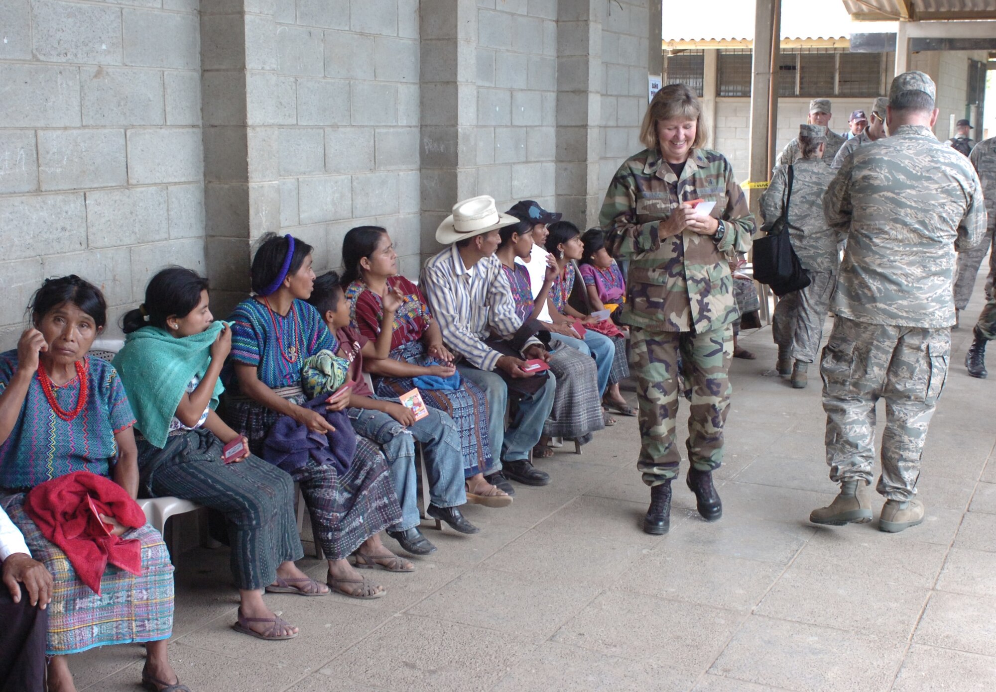 Guatemalans wait for their turn to be seen by U.S. medical professionals during a 15-day medical exercise that provides medical care to people in remote areas and a training opportunity for medical Airmen of the Arkansas Air National Guard. (U.S. Air Force photo) 
