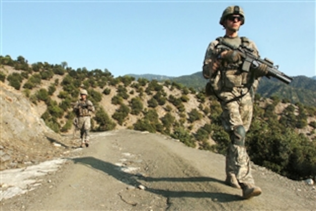 U.S. Army soldiers patrol the Korengal valley in Kunar province, Afghanistan, Aug. 18, 2009. The soldiers are assigned to Company B, 2nd Battalion, 12th Infantry Regiment, and have been battling insurgents in the valley since arriving in June.