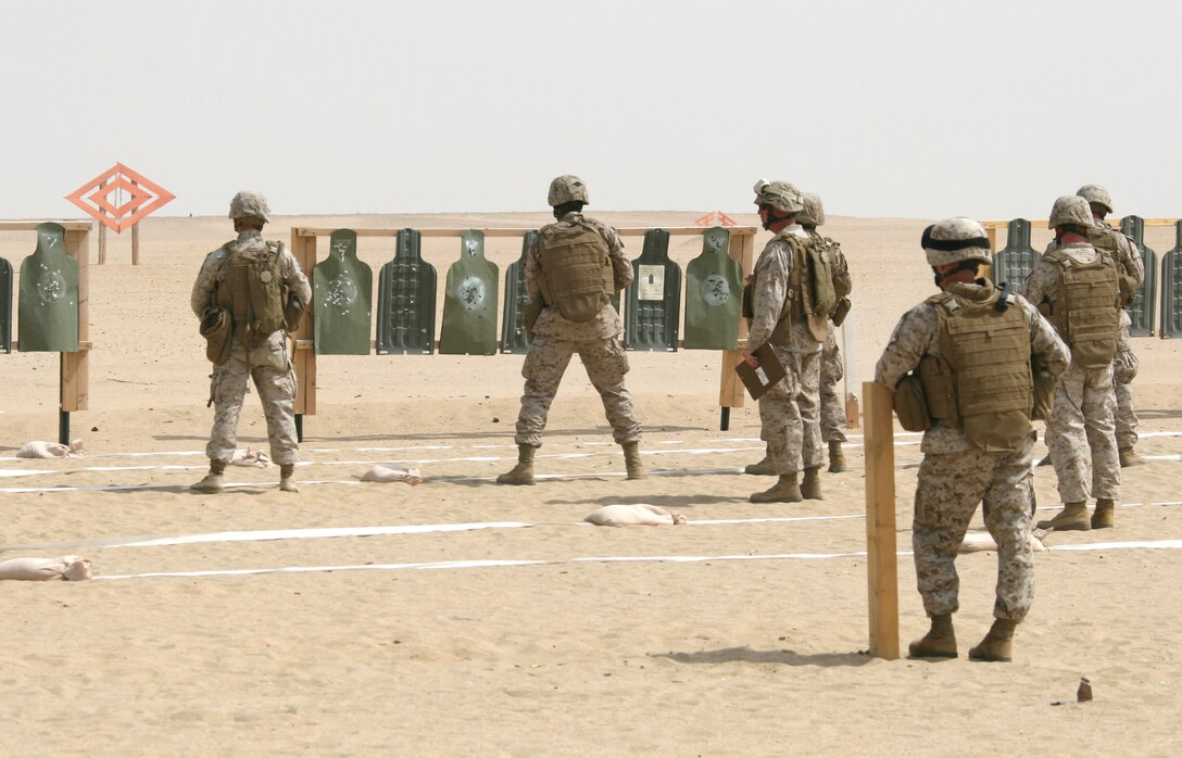 Marines from the 22nd Marine Expeditionary Unit fire their weapons during a Combat Marksmanship Program shoot at a training area near Camp Buehring, Kuwait Aug. 24, 2009. The 22nd MEU is conducting sustainment training ashore in Kuwait while serving as the theater reserve force for U.S. Central Command.
