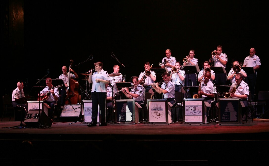 Technical Sgt. Paige Martin, vocalist for The Airmen of Note, leads the ensemble at the 3rd annual Joint Service Jazz Festival in Washington, DC.  The concert, which took place at the Carter Barron Amphitheatre on August 16th, also featured the Army Blues and the Navy Commodores.  (photo by SFC Mark Wood, U.S. Army Band)