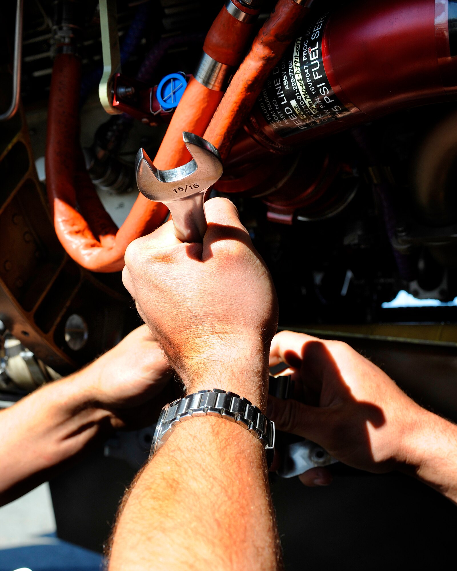 A member of the 354th Aircraft Maintenance Squadron puts the finishing touches on an aircraft component Aug. 20, 2009, Eielson Air Force Base, Alaska. 354th AMXS conducts on the spot repairs of Eielsons' F-16s. (U.S. Air Force photo/Airman 1st Class Willard E. Grande II)
