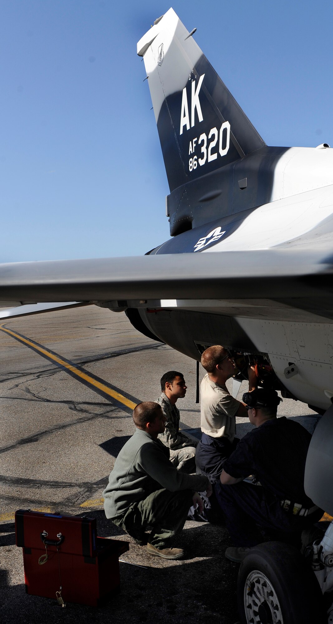 Iceman from the 354th Aircraft Maintenance Squadron troubleshoot a part in the aircrafts propulsion system Aug. 20, 2009, Eielson Air Force Base, Alaska. Once the jet lands a full diagnostic test is ran to ensure the aircraft is working properly (U.S. Air Force photo/Airman 1st Class Willard E. Grande II)