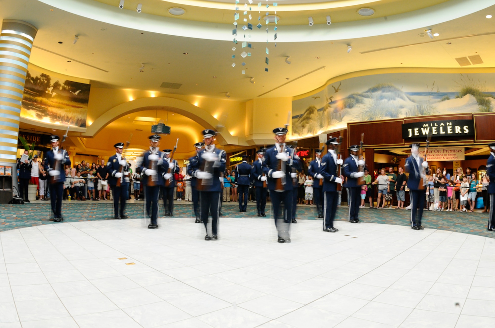 The United States Air Force Honor Guard Drill Team holds a back-to-back performance at a mall in Panama City, Fla., Aug. 21. This was the last stop for the Drill Team in Panama City before heading to MacDill Air Force Base. The team performs on military installations and in local communities during their Florida tour, showcasing Air Force professionalism and teamwork. (U.S Air Force photo by Senior Airman Alexandre Montes)