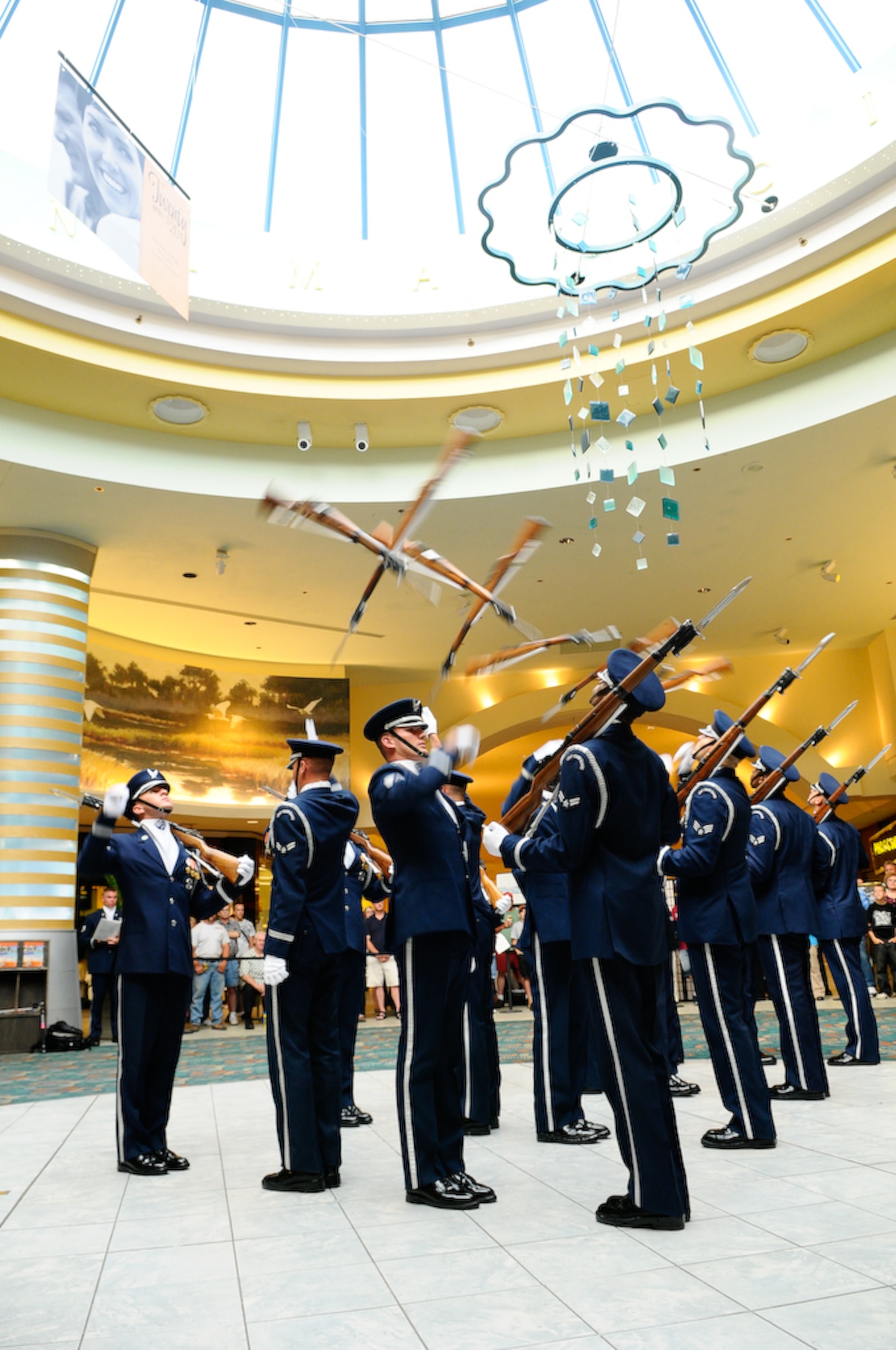 The United States Air Force Honor Guard Drill Team holds a back-to-back performance at a mall in Panama City, Fla., Aug. 21. This was the last stop for the Drill Team in Panama City before heading to MacDill Air Force Base. The team performs on military installations and in local communities during their Florida tour, showcasing Air Force professionalism and teamwork. (U.S Air Force photo by Senior Airman Alexandre Montes)