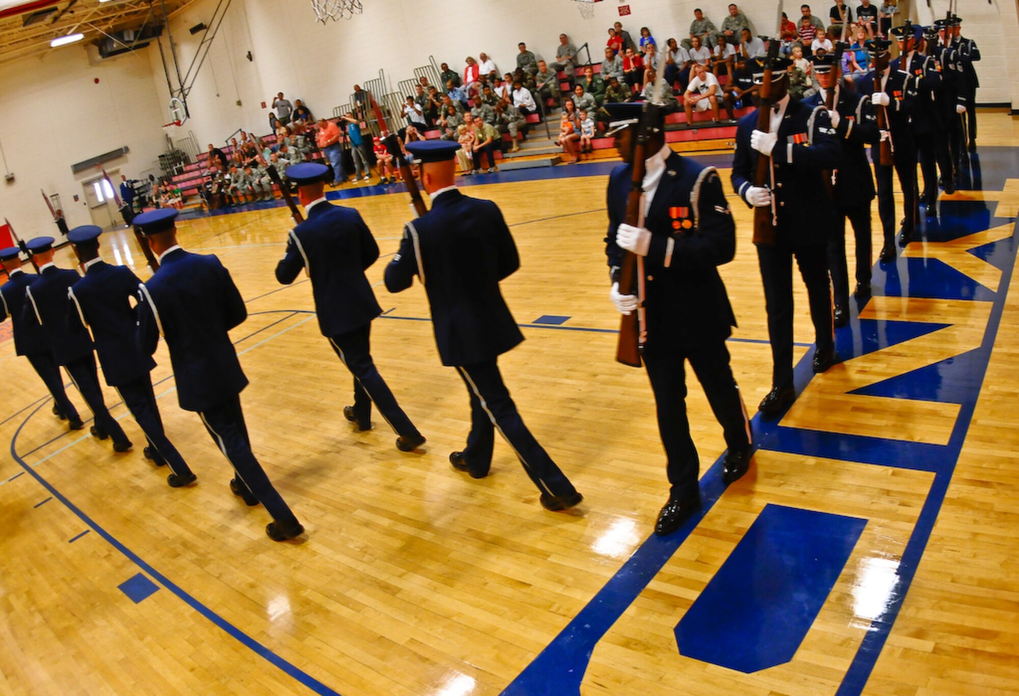 The United States Air Force Honor Guard Drill Team performs in the base fitness center Aug. 20 on Tyndall Air Force Base, Fla. The team performs on military installations and in local communities during their Florida tour, showcasing Air Force professionalism and teamwork. (U.S Air Force photo by Senior Airman Alexandre Montes)