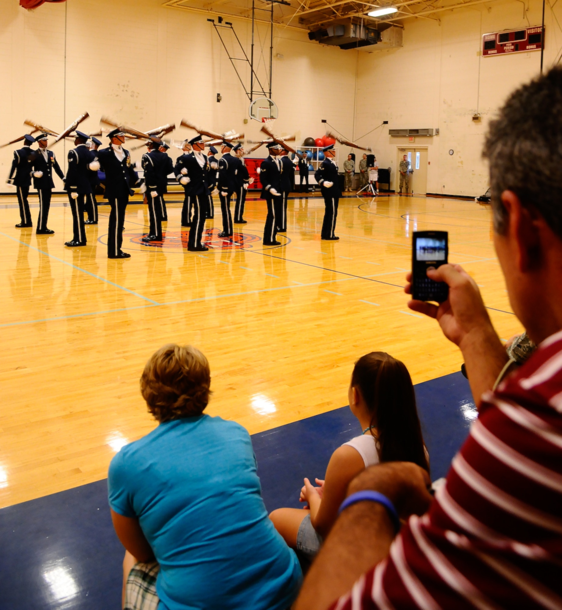 The United States Air Force Honor Guard Drill Team performs in the base fitness center Aug. 20 on Tyndall Air Force Base, Fla. The team performs on military installations and in local communities during their Florida tour, showcasing Air Force professionalism and teamwork. (U.S Air Force photo by Senior Airman Alexandre Montes)