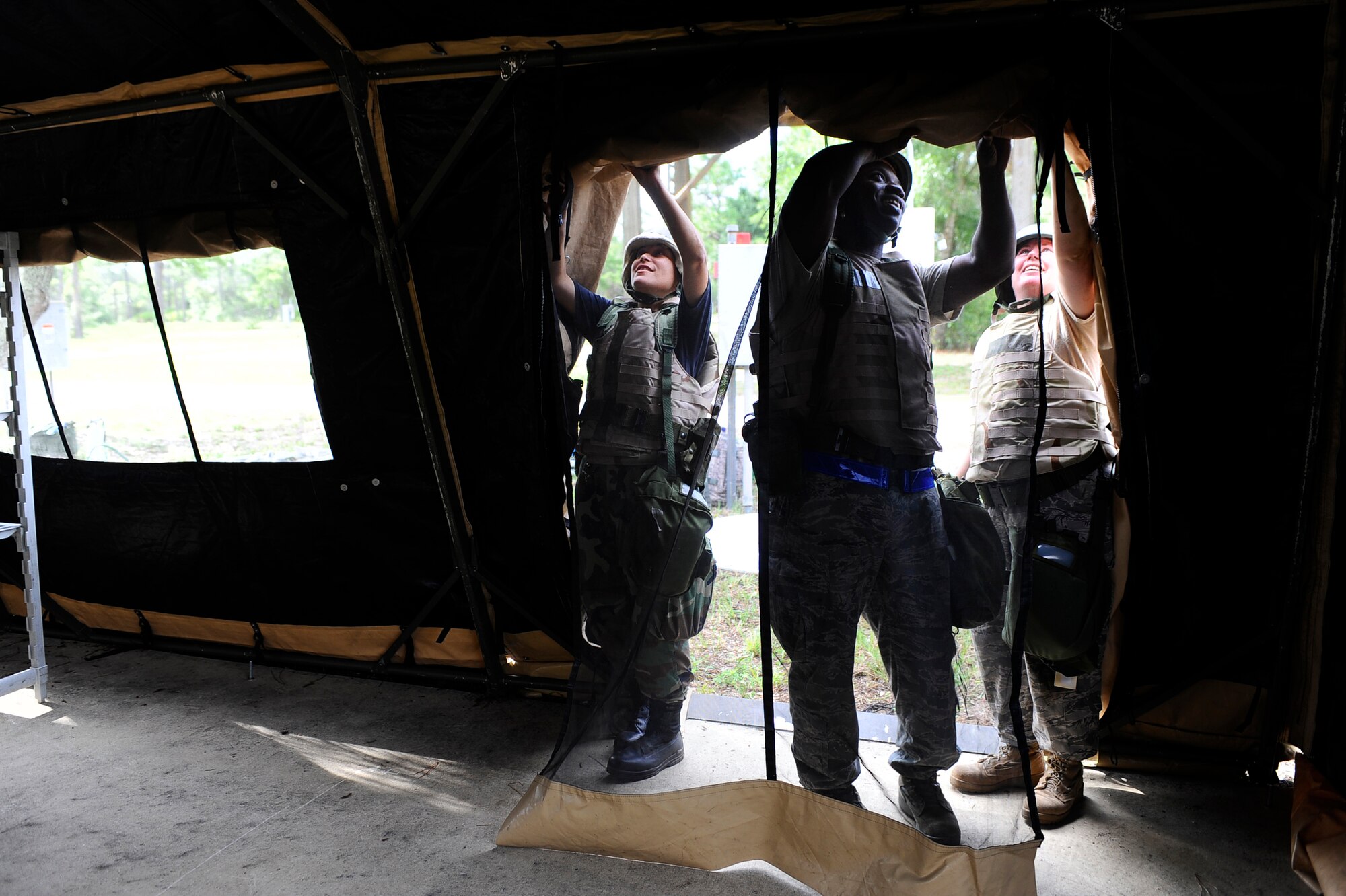Airmen set up tents as part of the Operational Readiness Exercise Aug. 18-21. Hurlburt Field will be hosting a series of exercises to prepare for the Operational Readiness Inspection in early 2010. (U.S. Air Force photo/Senior Airman Julianne Showalter)
