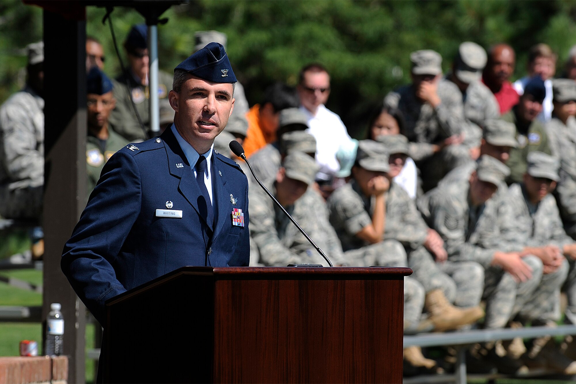 Col. Stephen Whiting, 21st Space Wing commander, addresses the crowd after assuming command of the 21st SW during the change of command ceremony at the base parade field Aug. 20. Prior to taking command of the 21st SW, he served as a member of the inaugural Chief of Staff of the Air Force Fellows Program, with duty at the Strategic Studies Group, in Newport, R.I. (Air Force photo by Craig Denton)