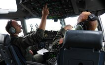 326th Airlift Squadron Pilots Capt. Steve Churchill and Capt. Dan Zappe conduct a training mission consisting of low-level navigation, assault landing zone operations, tactical arrivals and departures in Canadian military airspace Aug. 23. The training was part of the mission to 8 Wing Canadian Forces Base Trenton. In addition to the flight training, the first 512th Airlift Wing visit Aug. 22-24 to the Canadian wing was to forge a partnership and identify future training opportunities for flying, aerial port, airlift control and maintenance operations.(U.S. Air Force photo/Capt. Marnee A.C. Losurdo)