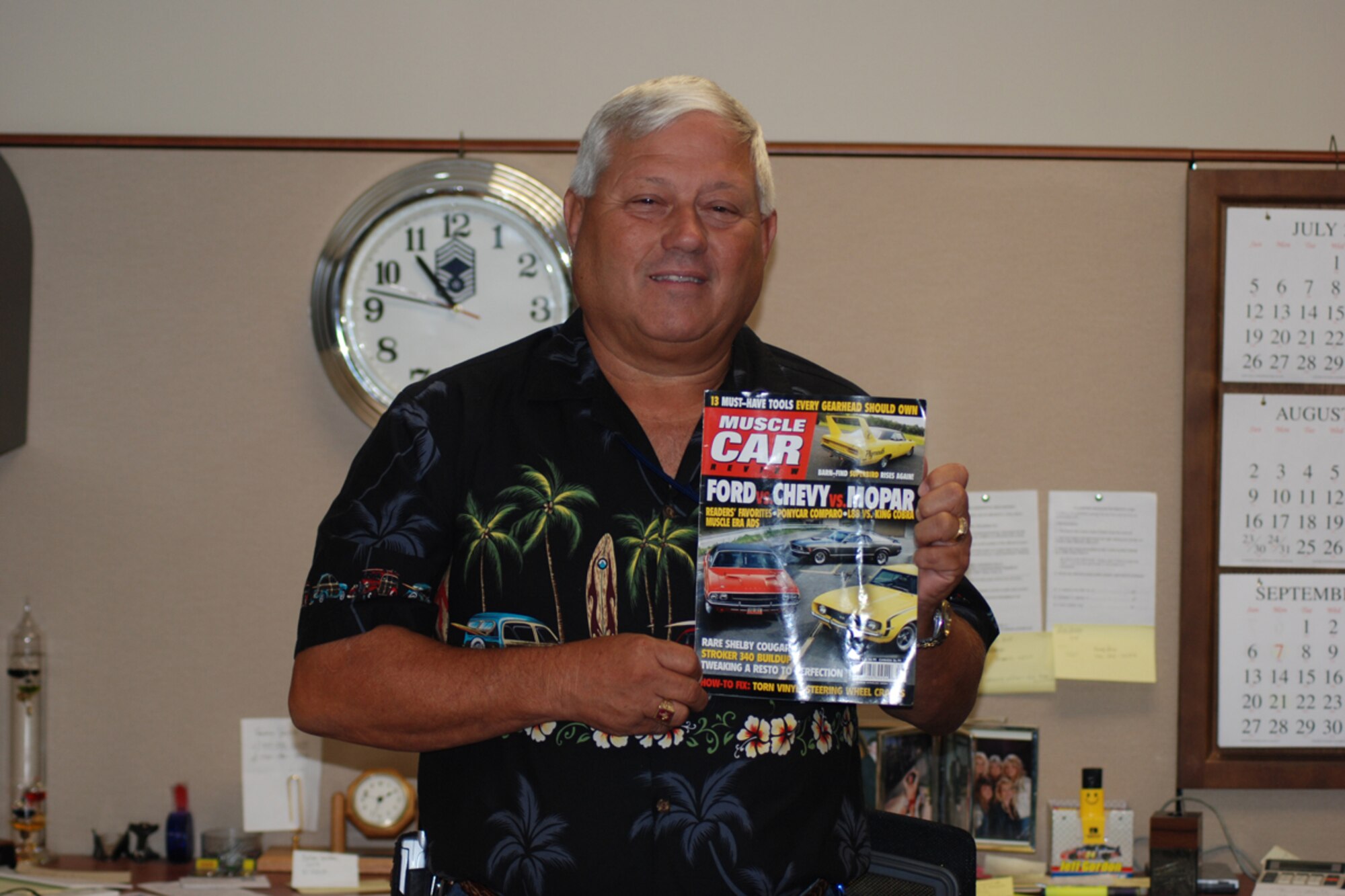 Dallas Godfrey, transportation accountable officer for the 94th Logistics Readiness Squadron and retired Chief Master Sgt. showcases his uniquely preserved 1970 Dodge Challenger R/T on the cover of the August 2009 issue of Muscle Car Review magazine. (U.S. Air Force photo/Tech. Sgt. James Branch)