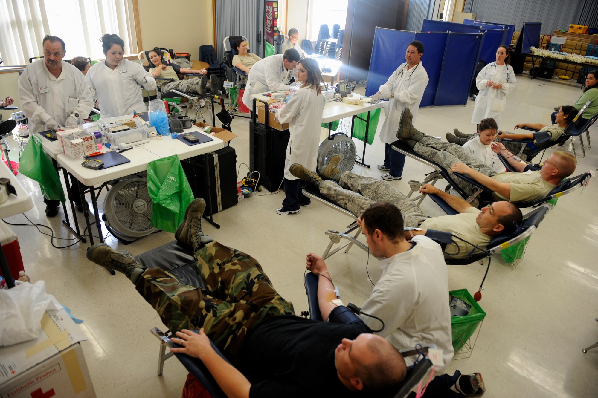MOUNTAIN HOME AIR FORCE BASE, Idaho-- Airmen donate blood Aug. 19 at the base chapel. The 366th Fighter Wing hosted a blood drive for the American Red Cross and collected 113 units of blood, beating the previous record of blood donated in one day by three. (U.S. Air Force photo by Airman 1st Class Renishia Richardson)