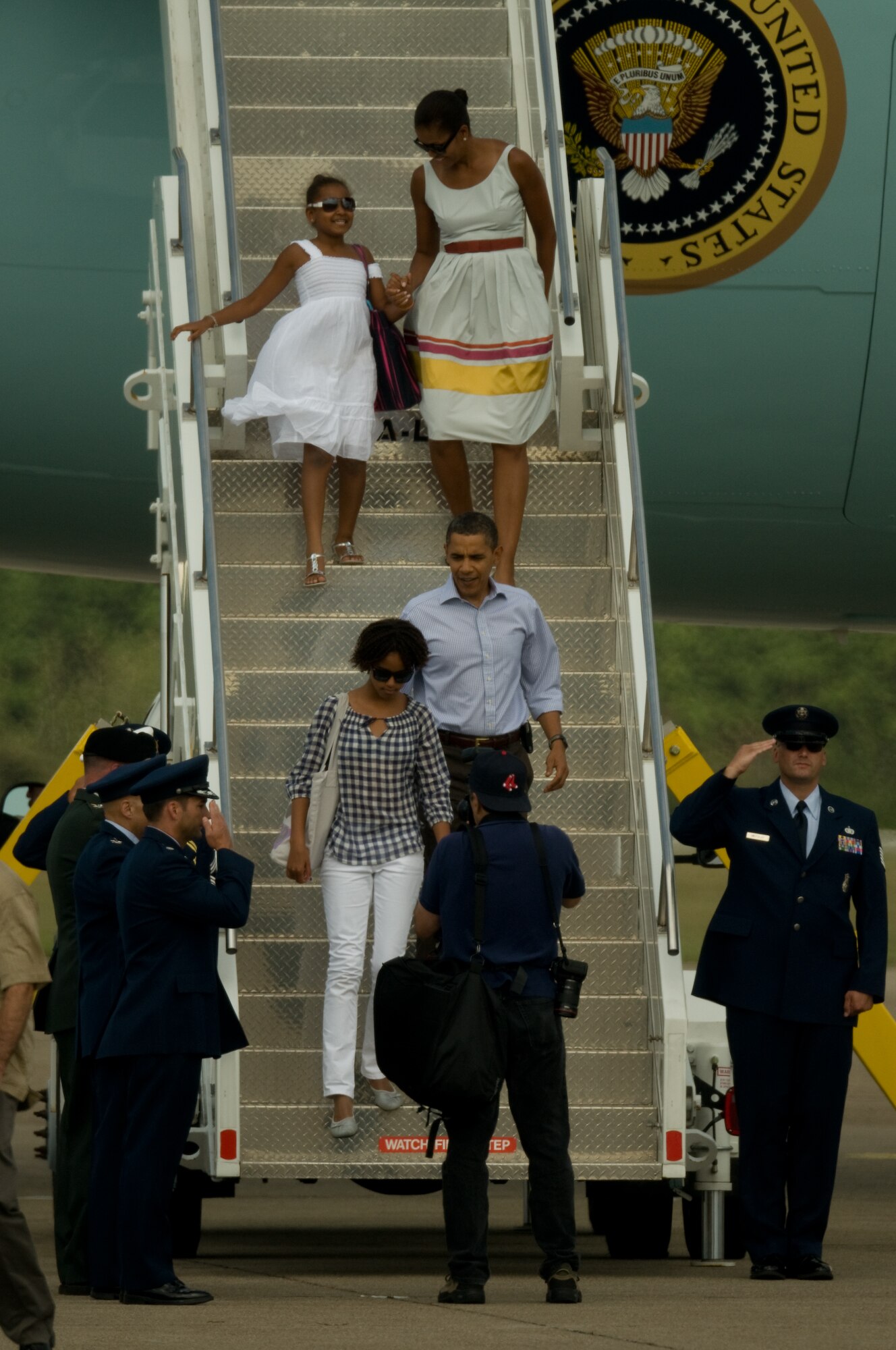 CAPE COD AIR FORCE STATION, Mass. – Lt. Col. Max Lantz, 6th Space Warning Squadron commander, greeted President Barack Obama and his family upon arrival by Air Force One at Cape Cod Coast Guard Air Station Aug. 23. From the airfield on the Massachusetts Military Reservation, Marine One helicopter pilots flew the First Family to Martha's Vineyard for vacation. The 6th SWS, located at Cape Cod Air Force Station, is a geographically separated unit of the 21st Space Wing and uses the Pave PAWS radar to guard North America's East Coast against ICBMs and sea-launched missiles. (Air Force photo by Master Sgt. Aaron Smith.)