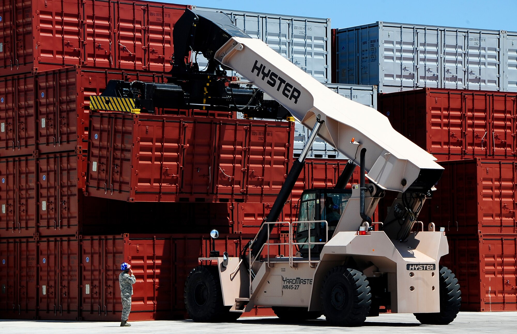 HOLLOMAN AIR FORCE BASE, N.M -- Members of the 49th Material Maintenance Group use the Hyster Yardmaster II Reach Stacker to move sea-land containers at Basic Expeditionary Airfield Resources Base July 29. The massive forklift is the largest in the Air Force inventory and is capable of lifting up to 100,000 pounds, or more than two F-22A Raptors. (U.S. Air Force photo by Tech. Sgt Chris Flahive)