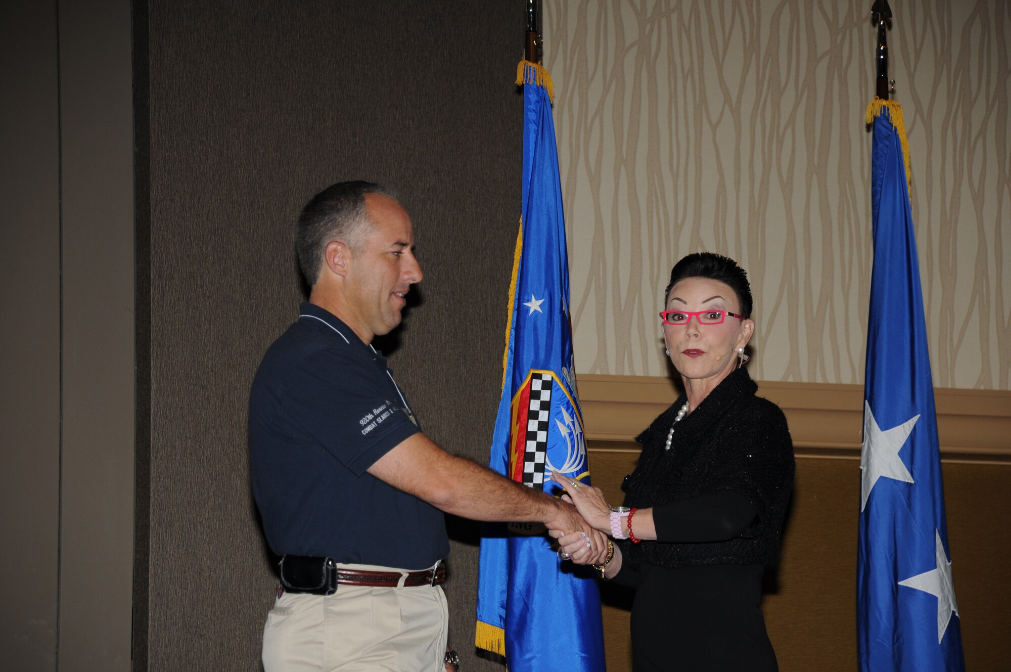 Jan Latiolais-Hargrave, Speaker & Seminar Leader Body Language Specialist, teaches Airmen and their families how to read body language at the Yellow Ribbon Conference.(USAF Photo/TSgt Denise Hauser)