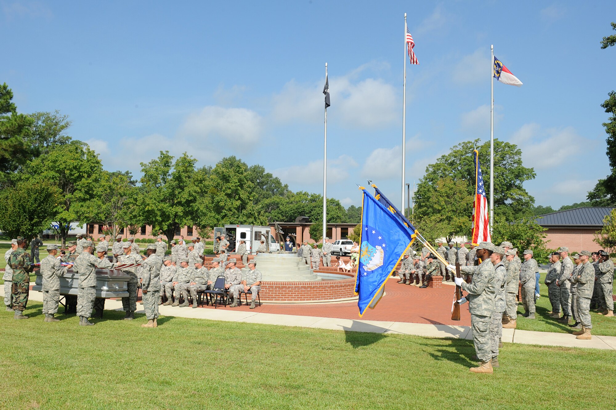 Honor guard Airmen prepare to render proper military honors as part of a graduation ceremony at Seymour Johnson Air Force Base, N.C., Aug. 19, 2009. Members of Team Seymour came to the honor guard graduation ceremony to support the 4th Fighter Wing and Charlotte Air National Guard Airmen on their completion of 10 days of training. (U.S. Air Force photo by Airman 1st Class Whitney Lambert)