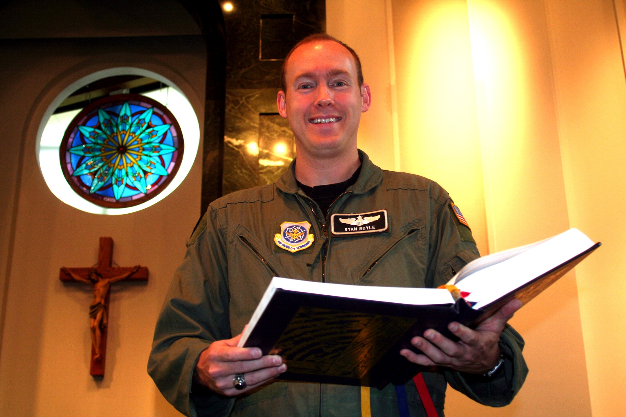 Maj. Ryan Boyle, formerly stationed at McChord Air Force Base, Wash., was one of two Air Mobility Command Airmen selected to attend seminary to become a Catholic priest and later, an Air Force chaplain.  Major Boyle begins attending seminary in Florida soon and is a recipient of the new Religious Professional Scholarship program approved by the Chief of Staff and Secretary of the Air Force to address critical religious needs of the service.  (U.S. Air Force Photo/Tech. Sgt. Scott T. Sturkol)
