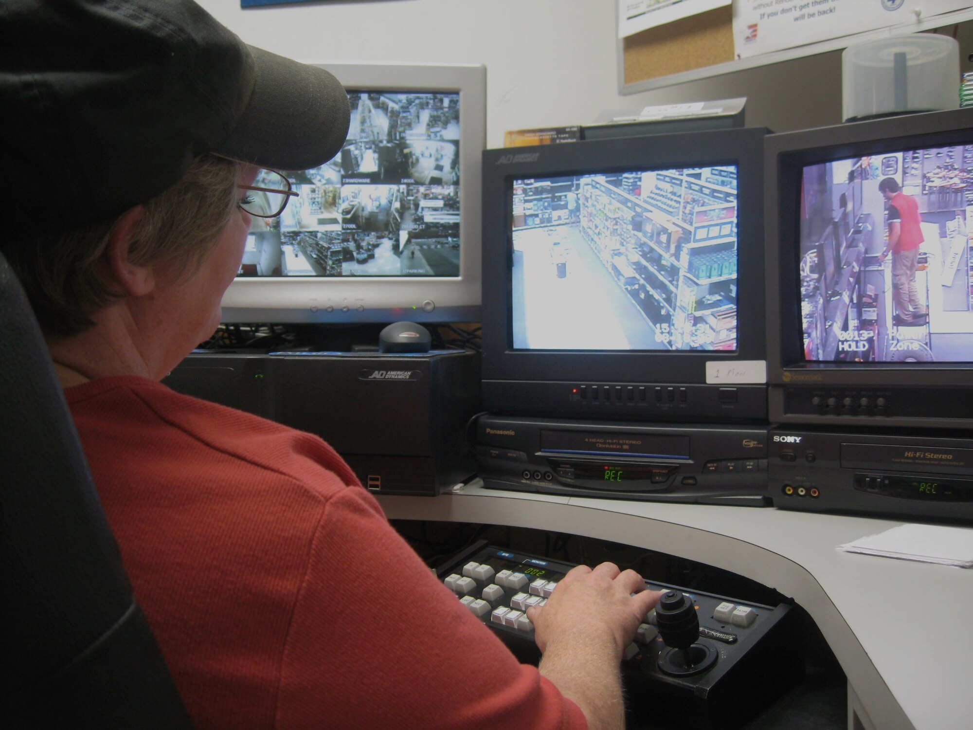 A member of the base exchange loss prevention team monitors activity on the sales floor Aug. 18, 2009. Although high-tech camera equipment at the BX provides a 360 degree color view of the store, exits and parking lot, the loss prevention team’s primary mission is not to catch shoplifters but to have a presence leading to prevention. (U.S. Air Force photo by Tech. Sgt. Tammie Moore)