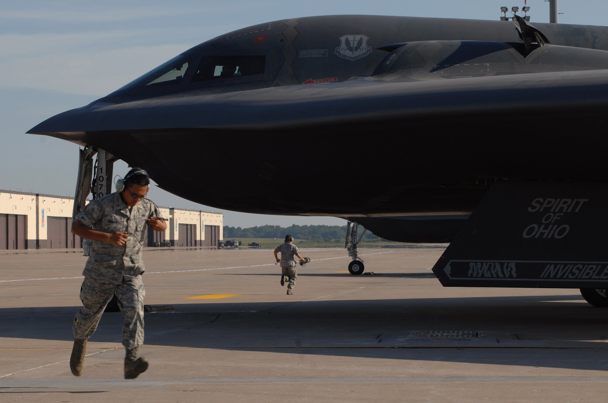 WHITEMAN AIR FORCE BASE, Mo. - 509th Aircraft Maintenance Squadron crew chiefs, take their positions prior to the takeoff of a B-2 Spirit, Aug. 24. 509th AMXS crew chief work around the clock with B-2 pilots training and staying prepared for real world missions. (U.S. Air Force photo/Senior Airman Kenny Holston)
