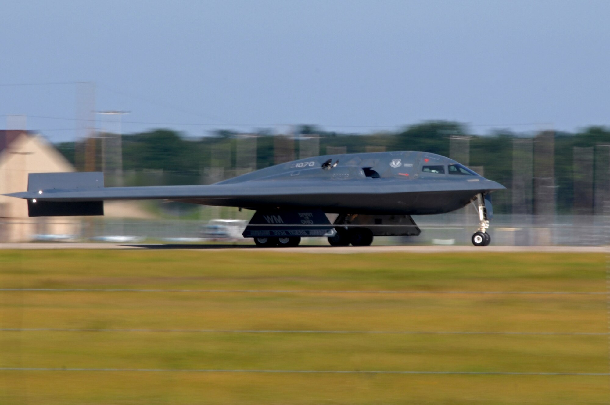 WHITEMAN AIR FORCE BASE, Mo.- A B-2 Spirit streaks down the runway during takeoff, Aug. 24. Twenty B-2 Spirit aircrafts are assigned to the 509th Bomb Wing. The B-2's primary mission is to attack time-critical targets early in a conflict to minimize an enemy's war-making potential. (U.S. Air Force photo/Senior Airman Kenny Holston)