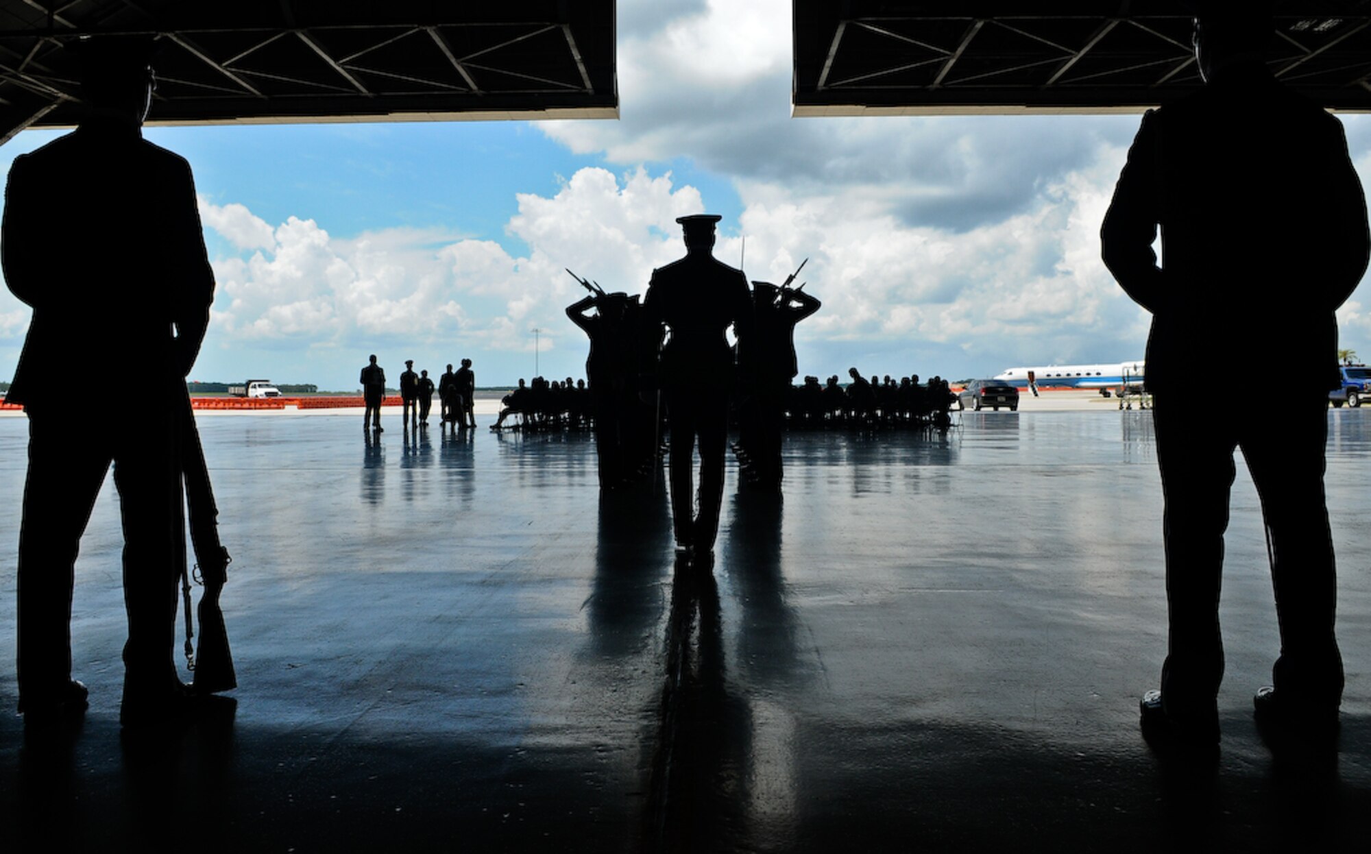 The United States Air Force Honor Guard Drill Team performs inside a hangar Aug. 25, at MacDill Air Force Base, Fla. This was a short stop for the team with only two more stops in Florida before heading to the West Coast where they will continue to showcase military precision and teamwork with their complex drill routine. (U.S. Air Force photo by Senior Airman Alexandre Montes) 