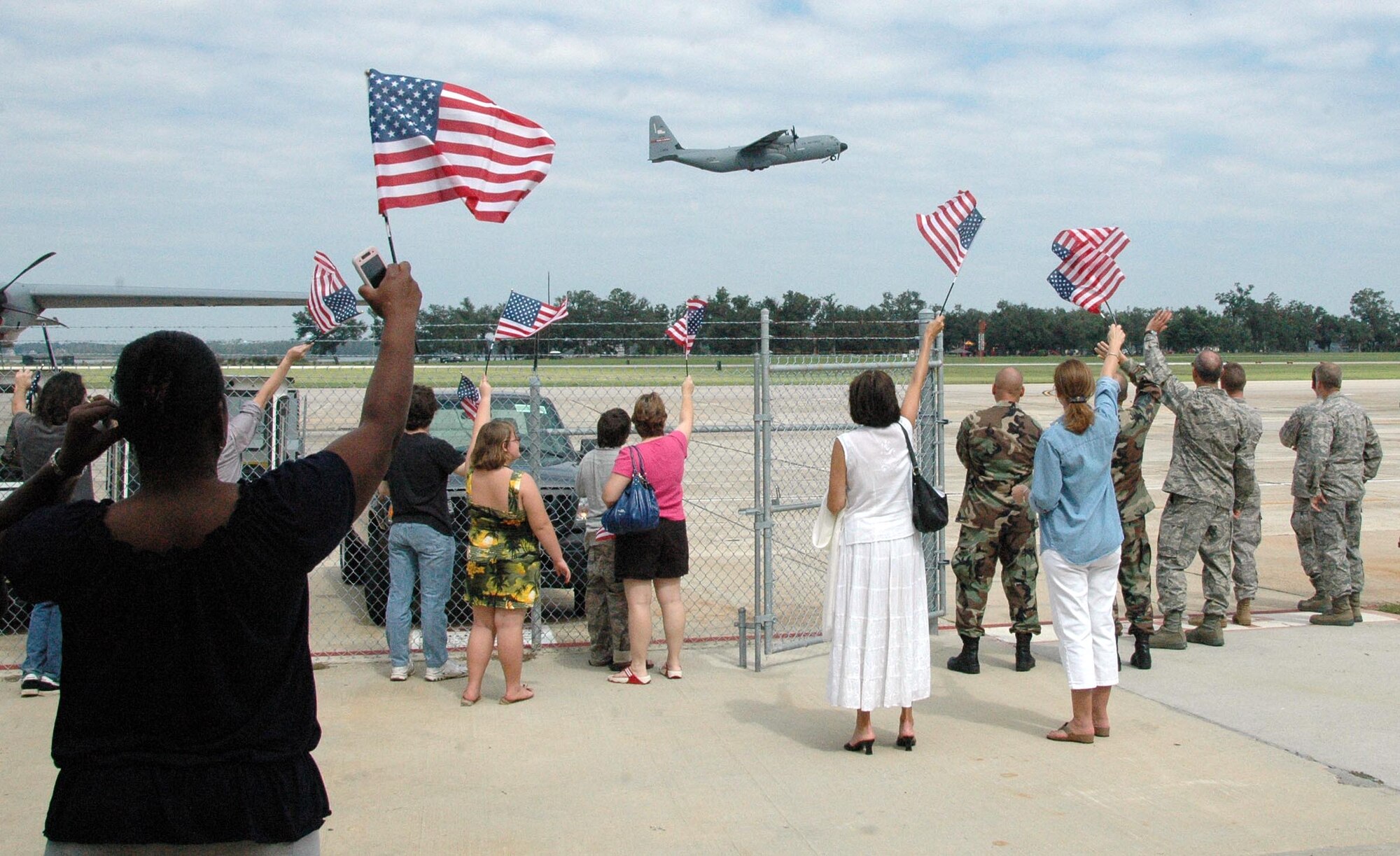 Family members of the 815th Airlift Squadron "Flying Jennies" bid farewell to their loved ones, who departed Keesler Air Force Base, Biloxi, Miss. Aug. 25 for their deployment to Southwest Asia.  While these Citizen Airmen are the first members of the 815th AS to depart, others are scheduled to leave in early September.