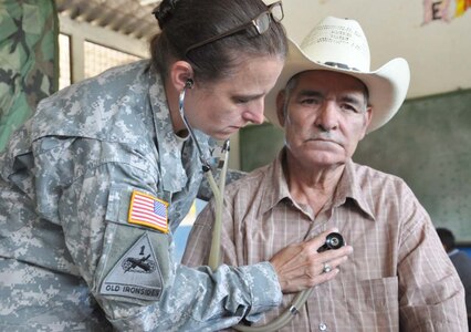 SAN FERNANDO, El Salvador – Army Lt. Col. Marie Dominguez, Medical Element commander, Joint Task Force-Bravo, checks the heartbeat of a Salvadoran patient during a Medical Training Exercise here Aug. 25. During the two-day MEDRETE, a combined U.S. and Salvadoran team provide free medical care to those most in need. In the MEDRETE’s first day, the medical team treated 364 Salvadoran patients (U.S. Air Force photo/1st Lt. Jennifer Richard).