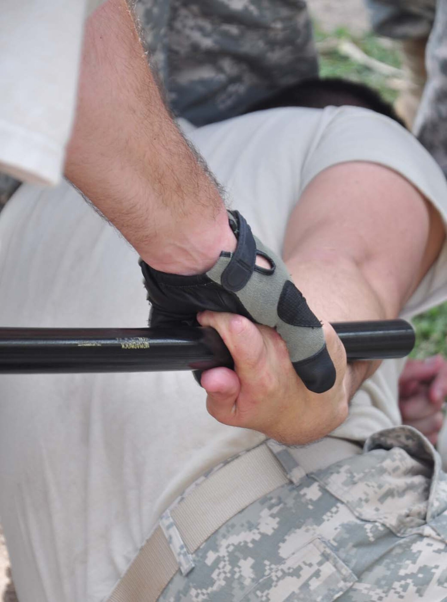 SOTO CANO AIR BASE, Honduras — Sergeant Robinson applies an advanced baton technique used to subdue someone who has tried to take away his baton by locking several fingers in place and using the baton as leverage. Sergeant Robinson said some nonlethal techniques seem violent, and may be misconstrued as an abuse of one’s human rights, but if a person resists then security forces members have the right to defend themselves (U.S. Air Force photo/Staff. Sgt. Chad Thompson).