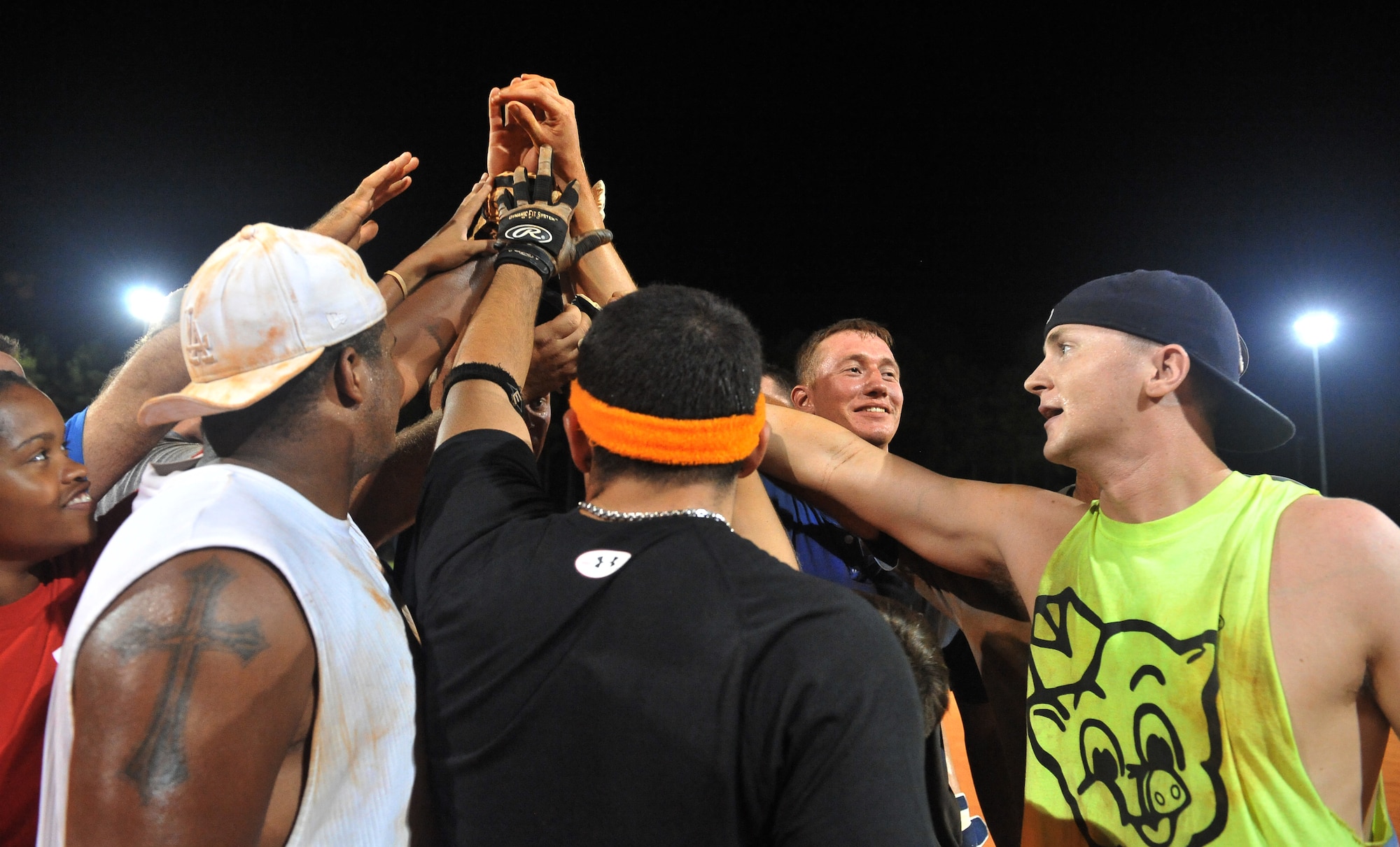 SHAW AIR FORCE BASE, S.C. -- Airmen of the 20th Aircraft Maintenance Squadron softball team come in for the final huddle after winning the last game of the softball season, August 20. The team edged out the "Civees" 15-14. (U.S. Air Force photo/Senior Airman Kathrine McDowell)
