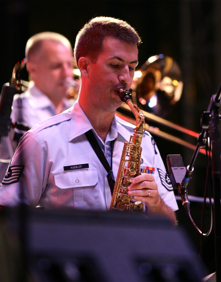 Technical Sgt. Tyler Kuebler, a member of the Airmen of Note’s saxophone section, performs during the 3rd annual Joint Service Jazz Festival in Washington, DC.  The concert, which took place at the Carter Barron Amphitheatre on August 16th, also featured the Army Blues and the Navy Commodores.  (photo by SFC Mark Wood, U.S. Army Band)