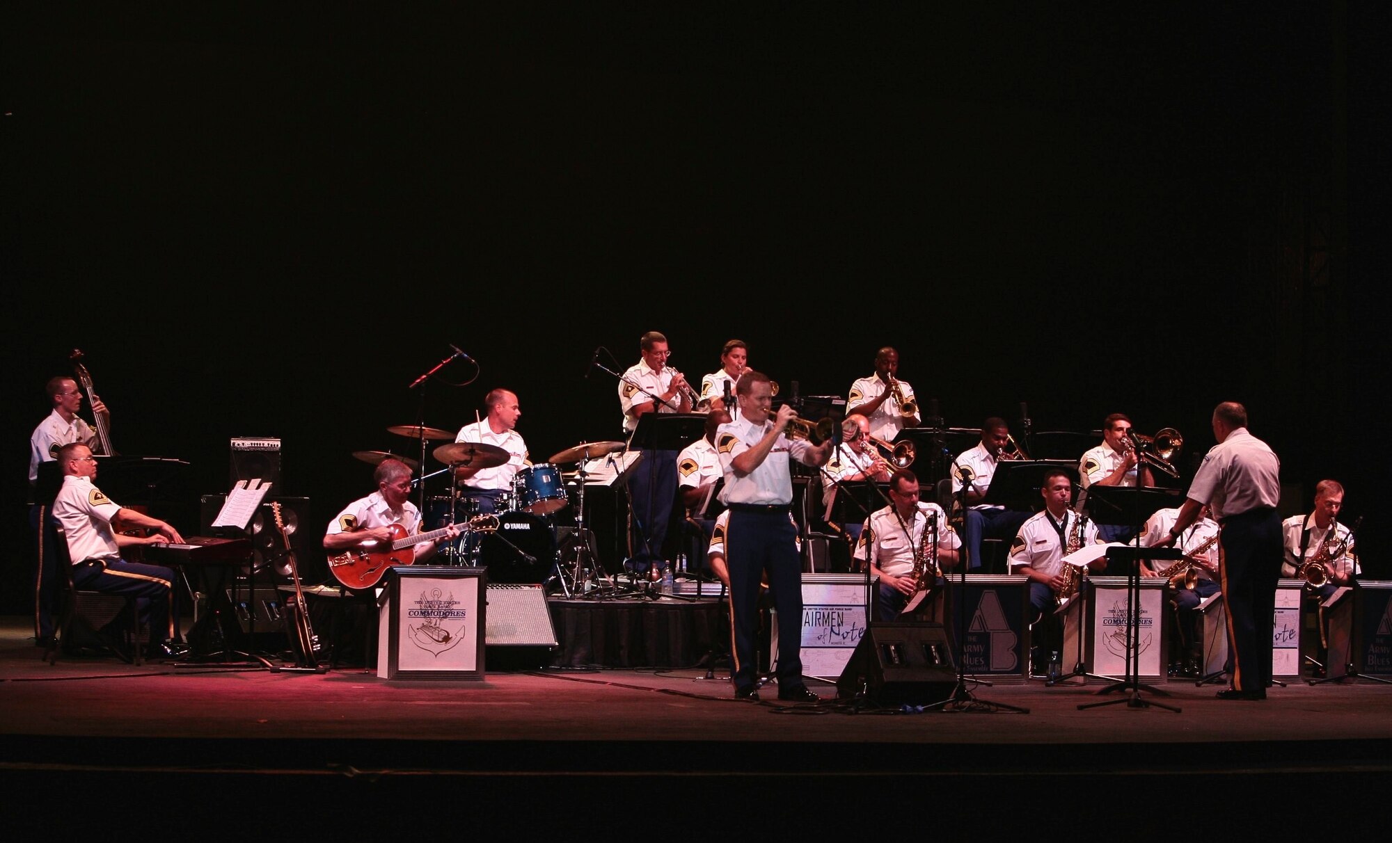 The Army Blues, a component of the United States Army Band in Washington, DC, performs during the 2009 Joint Service Jazz Festival.  The Army Blues (stationed nearby at Fort Myer in Virginia) played an awesome set – highlighting the wonderful soloists that fill each section.  The event, hosted by the USAF Band’s Airmen of Note, took place at the Carter Barron Amphitheatre on August 16th.  The Navy Commodores were also featured on the program.  (photo by SFC Mark Wood, U.S. Army Band)