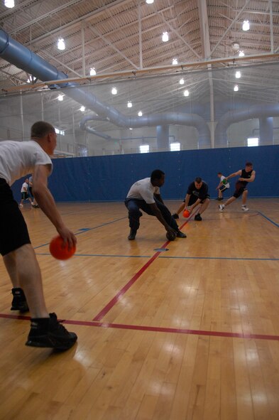 MINOT AIR FORCE BASE, N.D. -- Minot Air Force Base Airmen compete against each other in dodge ball competition as part of the wing annual Summerfest  here, Aug. 21. Summerfest is a morale and teambuilding program designed to test the team spirit and ingenuity of Airmen as they compete in various events for the Summerfest Championship trophy. (U.S. Air Force photo by Airman 1st Class Jesse Lopez)