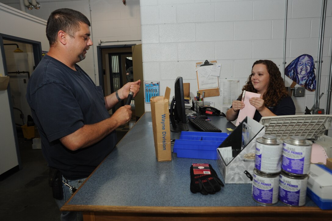 LANGLEY AIR FORCE, Va. -- Sean Call, 1st Civil Engineer Squadron liquid fuels foreman, purchases supplies at the B3 Servmart hardware store here Aug. 21.  ServMart is located within the main CES building where it sells common construction, plumbing and electrical supplies to Langley customers. (U.S. Air Force photo/Staff Sgt. Barry Loo)
