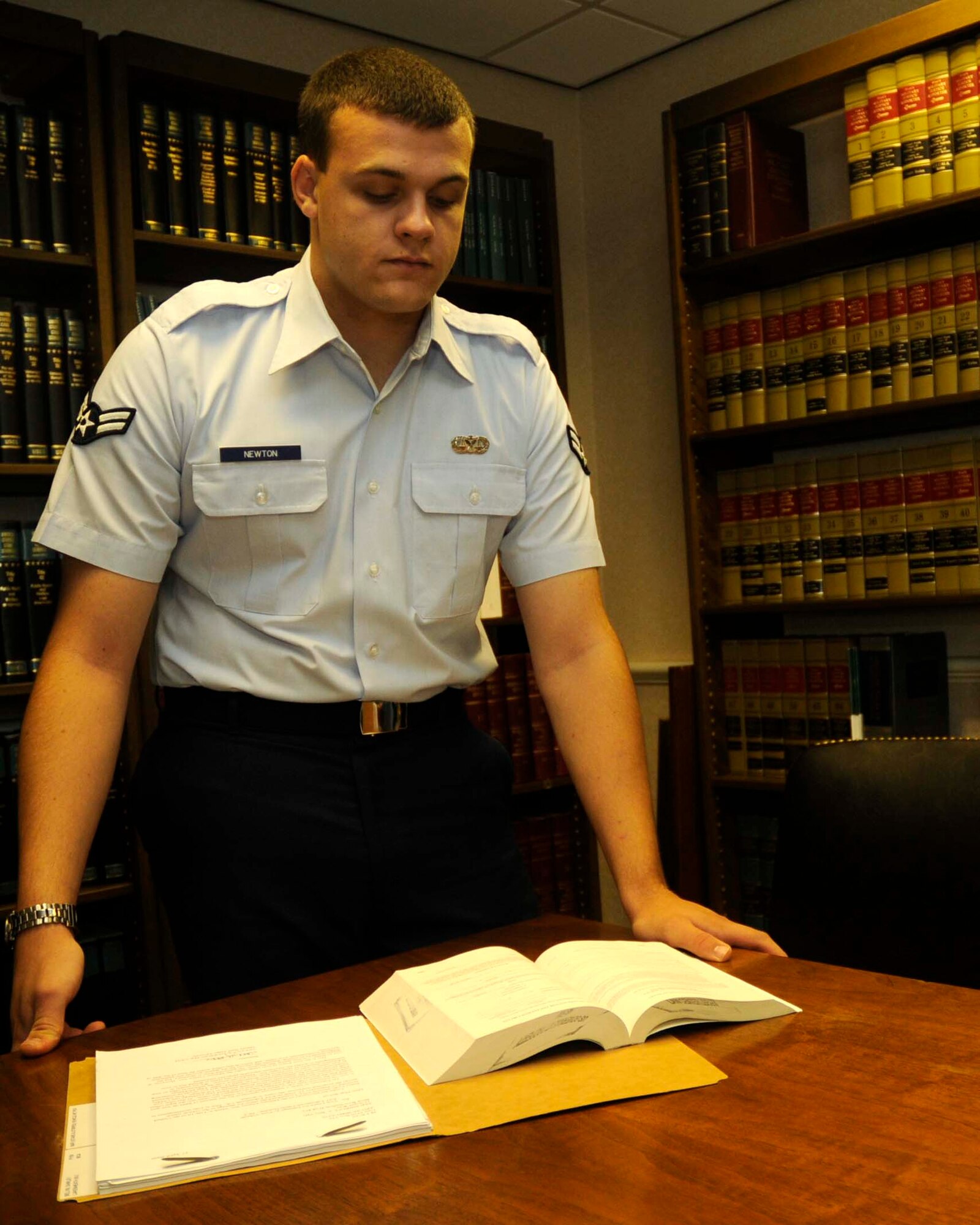 Airman 1st Class Brian Newton, 48th Fighter Wing Judge Advocate Office general and international law paralegal, was nominated for the Liberty Spotlight by his chain of command because he practices the Air Force core value of "Excellence in All We Do."