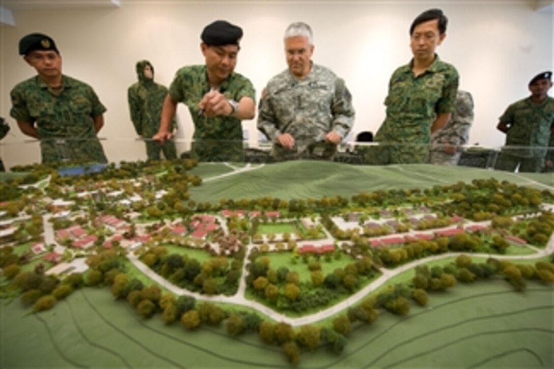 Singapore army Lt. Col. Jimmy Toh briefs the Chief of Staff of the Army Gen. George W. Casey Jr. about the Murai Urban Warfare Training Facility in Singapore on Aug. 26, 2009.  