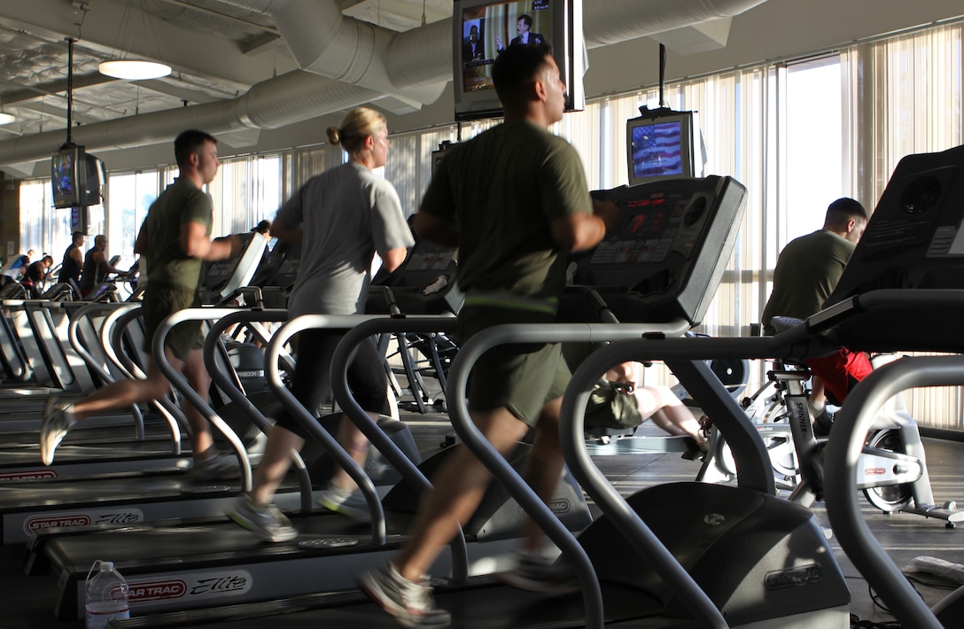 MARINE CORPS BASE CAMP PENDLETON -- Marines break a sweat at Paige Field House, Aug. 25. Return to Readiness has helped rehabilitate over 8,000 injured Marines, sailors and soldiers on Camp Pendleton during the past nine years. RTR facilitates Marines going back to full duty post injury.