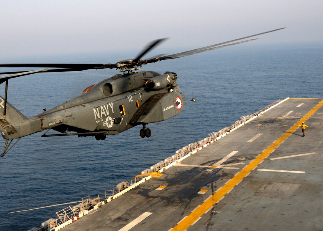 USS Bataan, At sea (August 26, 2009) – An MH-53 Sea Dragon assigned to the “Blackhawks” of Helicopter Mine Countermeasures Squadron (HM)15 prepares to land on the flight deck of the of the multi-purpose amphibious assault ship USS Bataan (LHD 5) during routine flight operations. The Bataan Amphibious Ready Group (ARG) is conducting Maritime Security Operations (MSO) in the U.S. 5th Fleet area of operations.