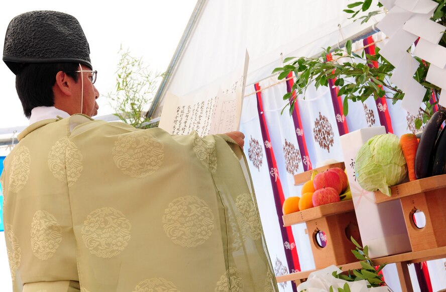 KADENA AIR BASE, Japan -- A Shinto priest gives a traditional ceremonial blessing for a safe construction project at the ground breaking of the new Erwin PME Center here. The ceremony is customary for Japanese construction and for the "user" of the facility to be invited to take part in the ceremony. (U.S. Air Force photo/Tech. Sgt. Rey Ramon) 
