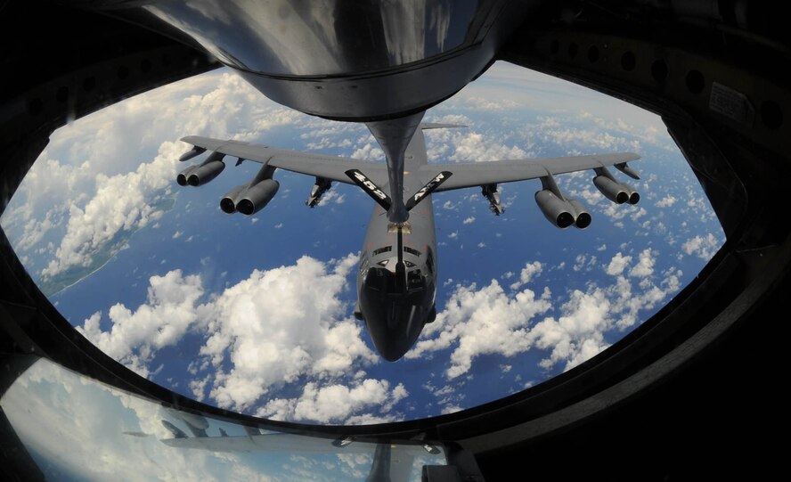 ANDERSEN AIR FORCE BASE, Guam -- A B-52 Stratofortress bomber approaches for a refueling over the Pacific Ocean Aug. 13. KC-135 Stratotankers, F-22 Raptors and B-52 Stratofortress bombers took part in the 2009 Inaugural Turkey Shoot Competition, which allows air expeditionary units to plan and execute tactical missions with airframes that don't regularly train together. The B-52's are deployed from Barksdale Air Force Base, La., to Andersen AFB to support U.S. Pacific Command's Continuous Bomber Presence in the Asia-Pacific region. (U.S. Air Force photo/Senior Airman Christopher Bush) 