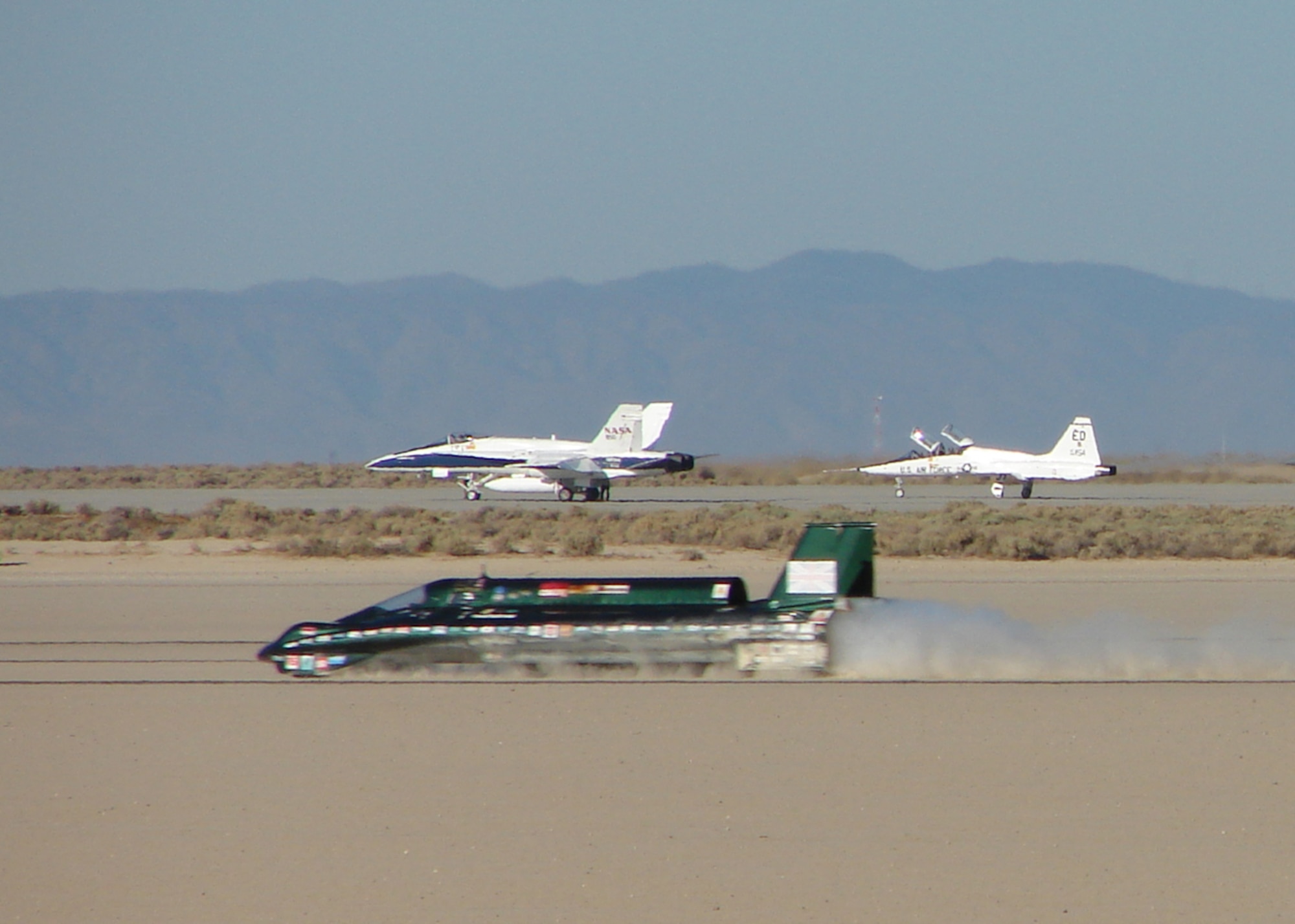 The British steam car breaks the record for the fastest speed reached by a steam car here Aug 26. The car traveled  148.786 miles per hour across Rodger's dry lake bed. (photo/James Rice)