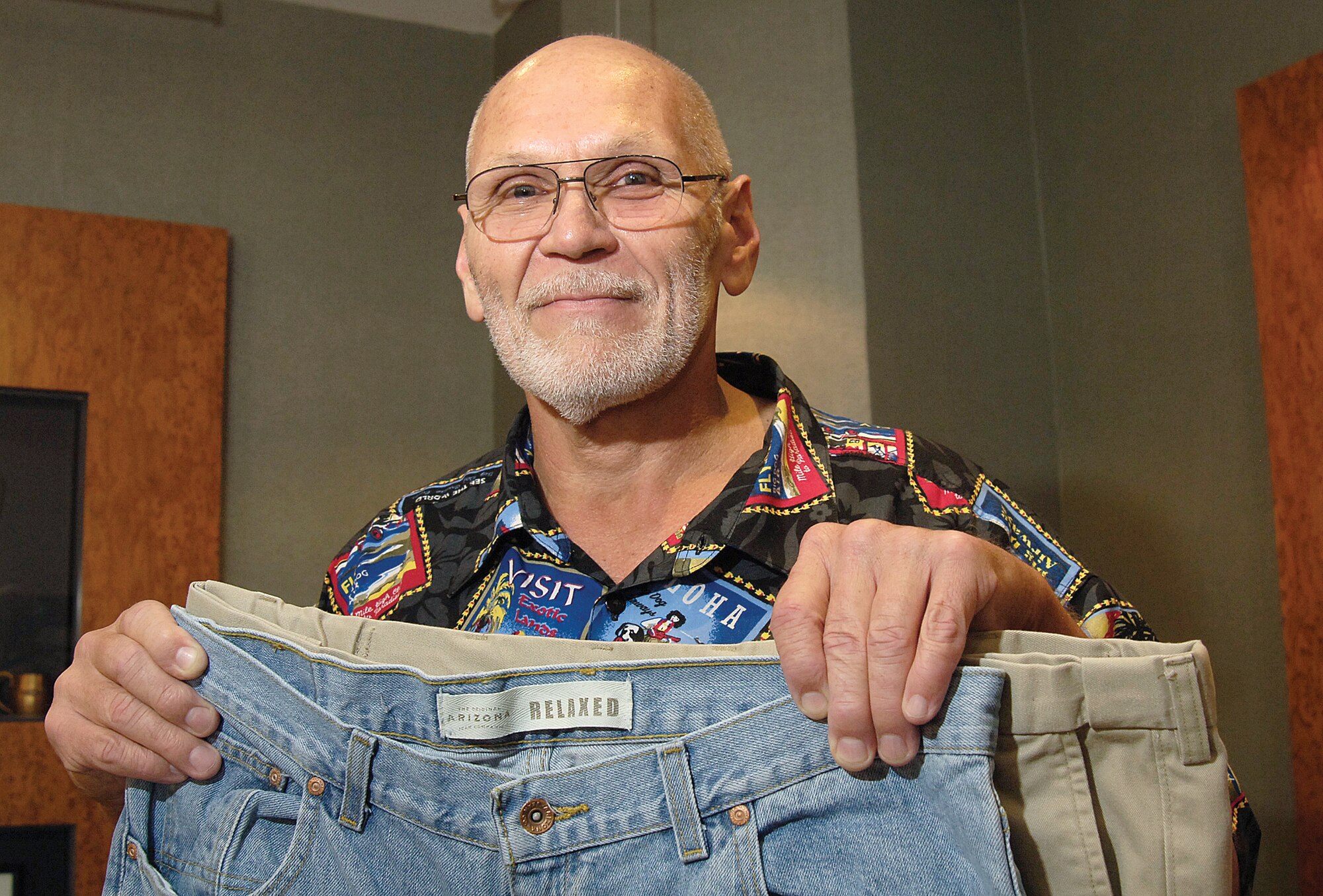 When Jimmy Nation had to “come back up for air” just to put on his shoes it was an incentive to begin a weight loss journey that keeps yielding happy results.  His pant size shrinking from a 44- to a 38-inch waist is positive reinforcement of the progress the 76th Maintenance Operation Center production controller has made. (Air Force photo by Margo Wright)