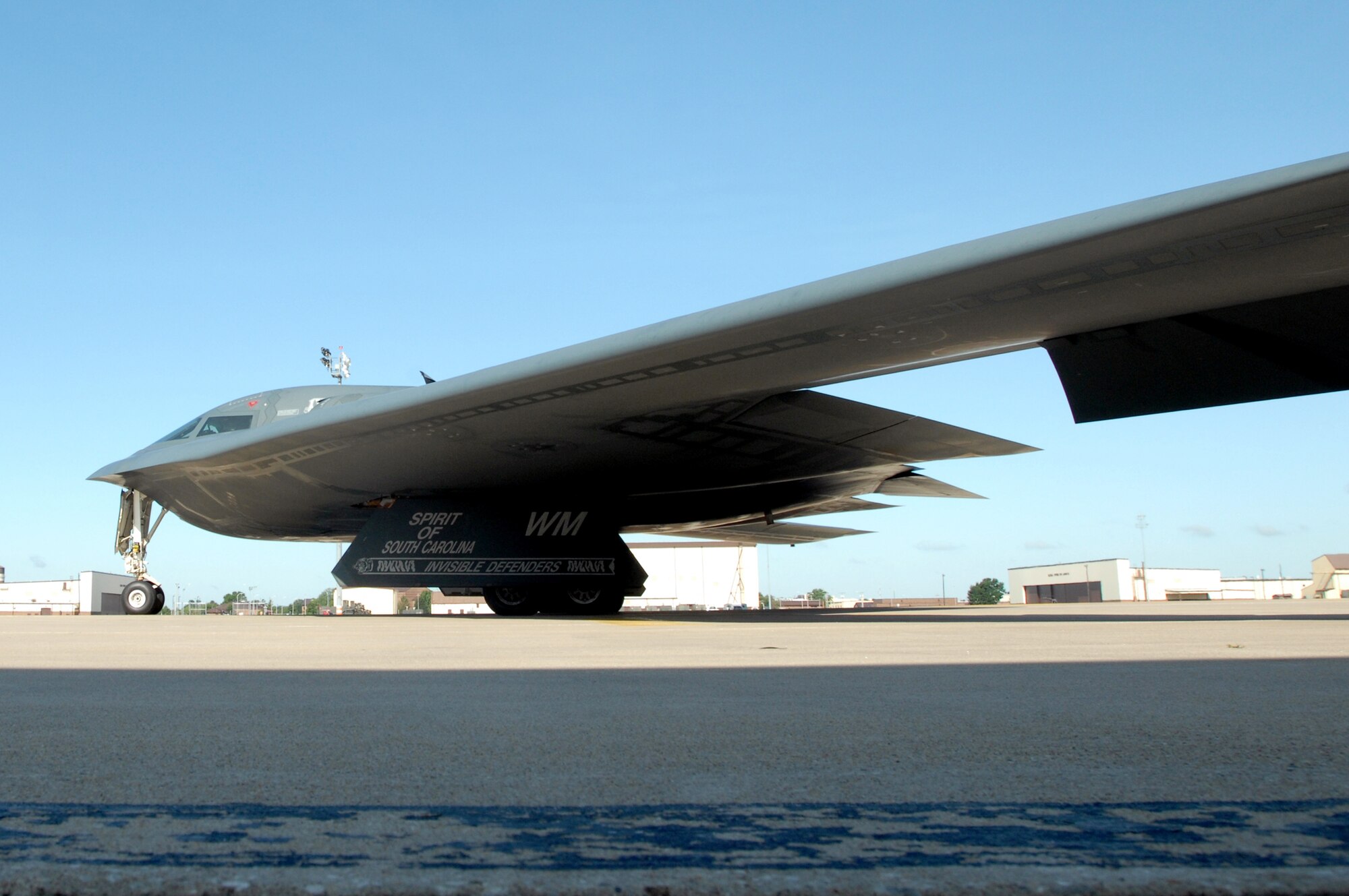 A B-2 Spirit taxis down the flightline at Whiteman Air Force Base, Mo., Aug. 22. Twenty B-2 bombers are assigned to the 509th Bomb Wing. The B-2 brings massive firepower to bear, in a short time, anywhere on the globe through previously impenetrable defenses. (U.S. Air Force photo/Senior Airman Kenny Holston)